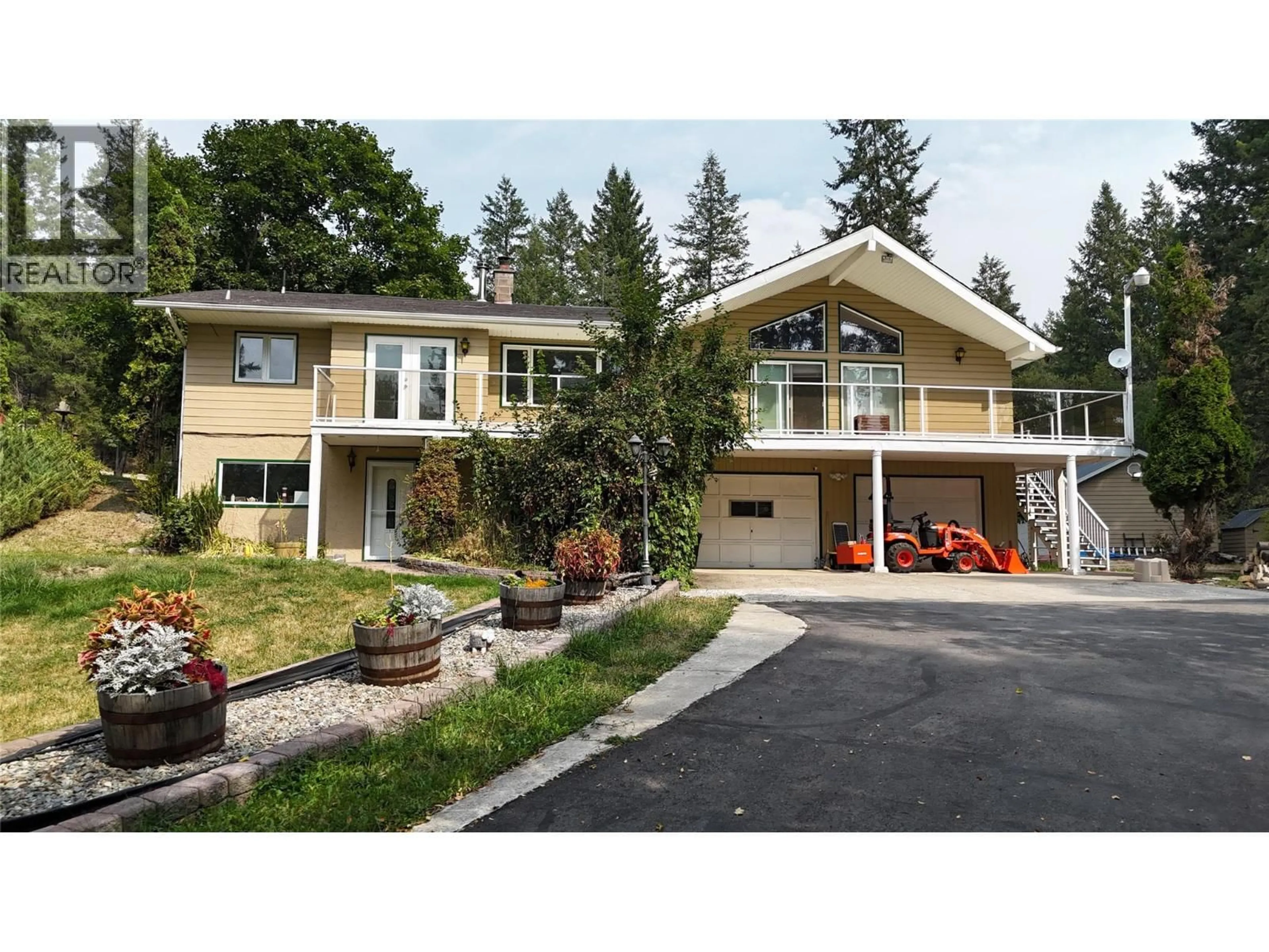 Home with vinyl exterior material, street for 1270 FOX TREE ROAD, Lister British Columbia V0B1G2