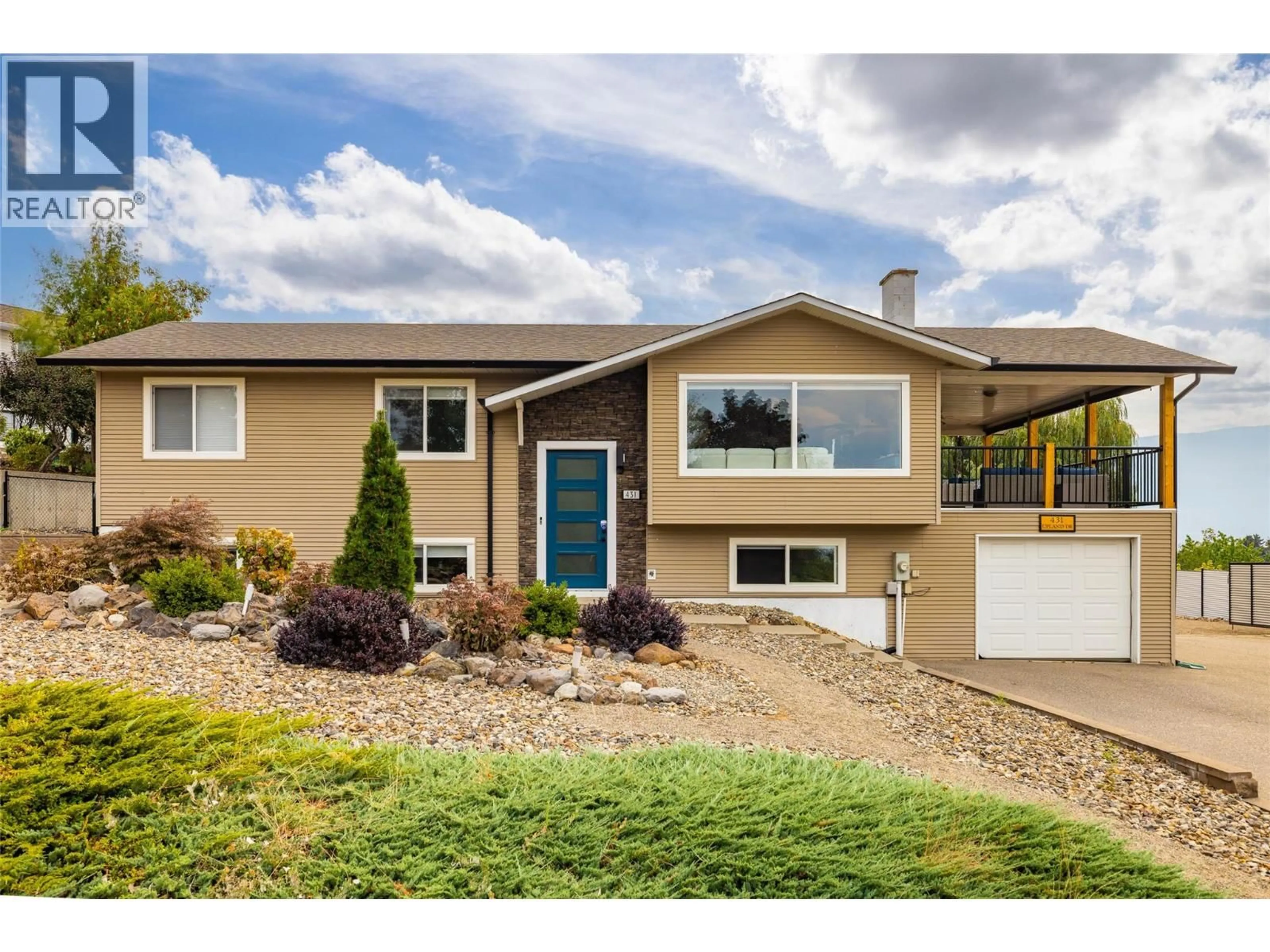 Home with vinyl exterior material, street for 431 UPLAND DRIVE, Coldstream British Columbia V1B2X7
