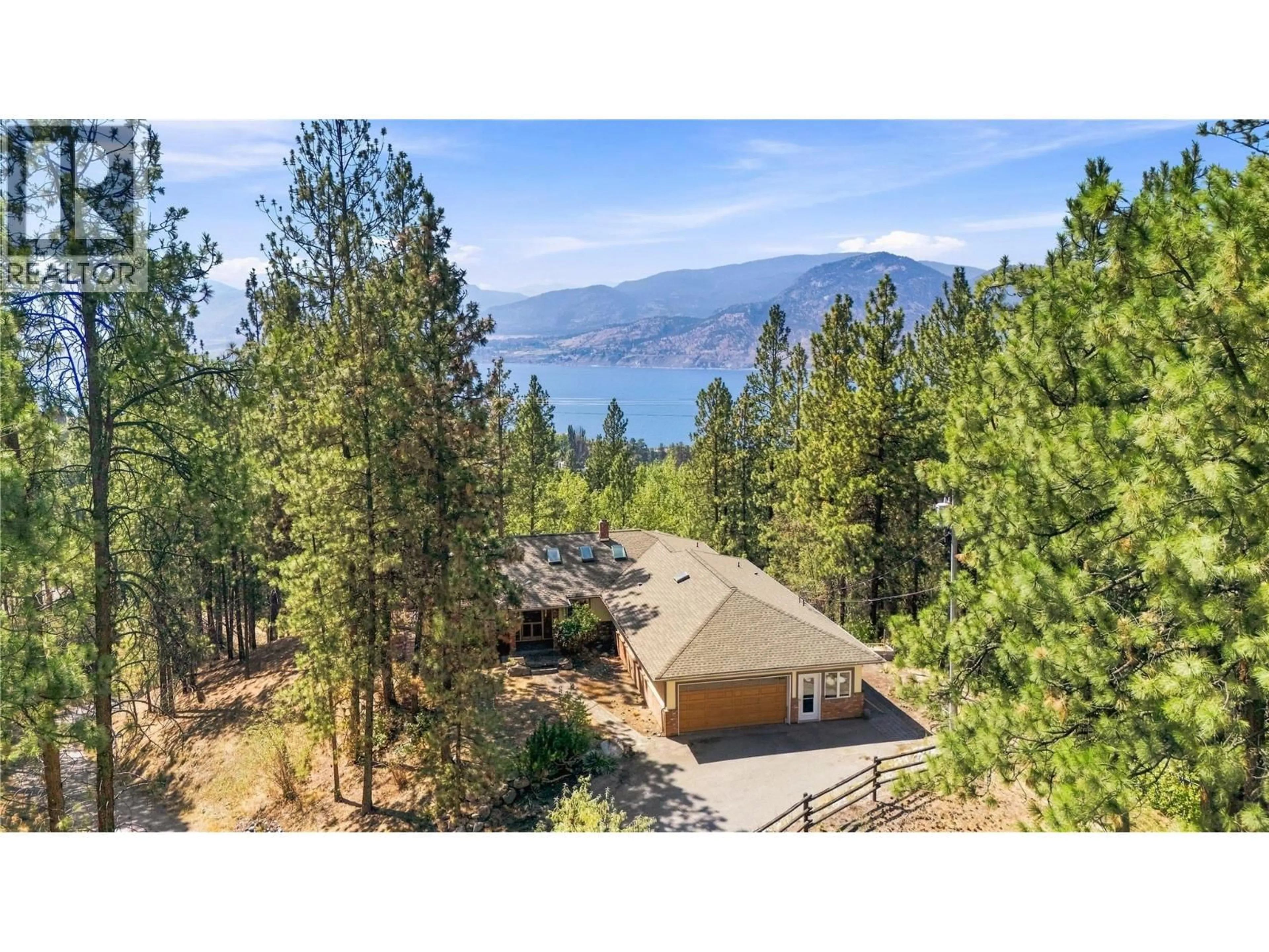 A pic from outside/outdoor area/front of a property/back of a property/a pic from drone, water/lake/river/ocean view for 1970 SUTHERLAND ROAD, Penticton British Columbia V2A8T8