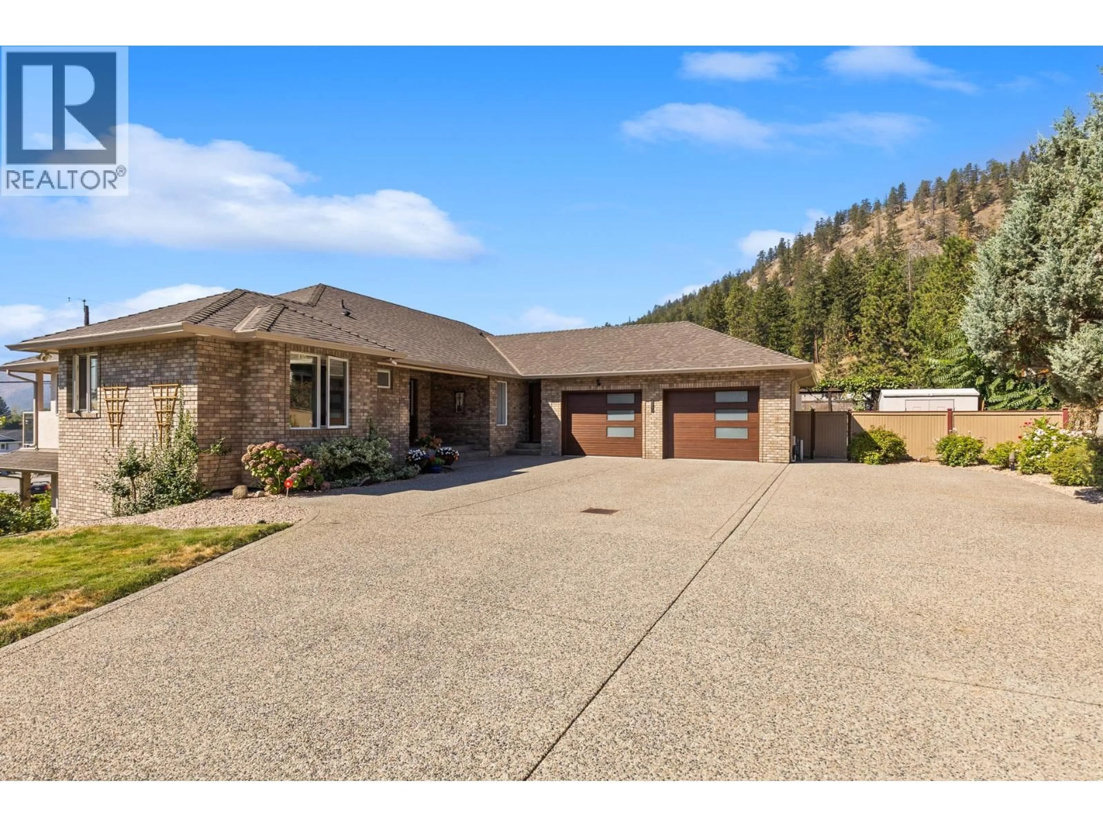 A pic from outside/outdoor area/front of a property/back of a property/a pic from drone, unknown for 5990 VICTORIA STREET, Peachland British Columbia V0H1X4
