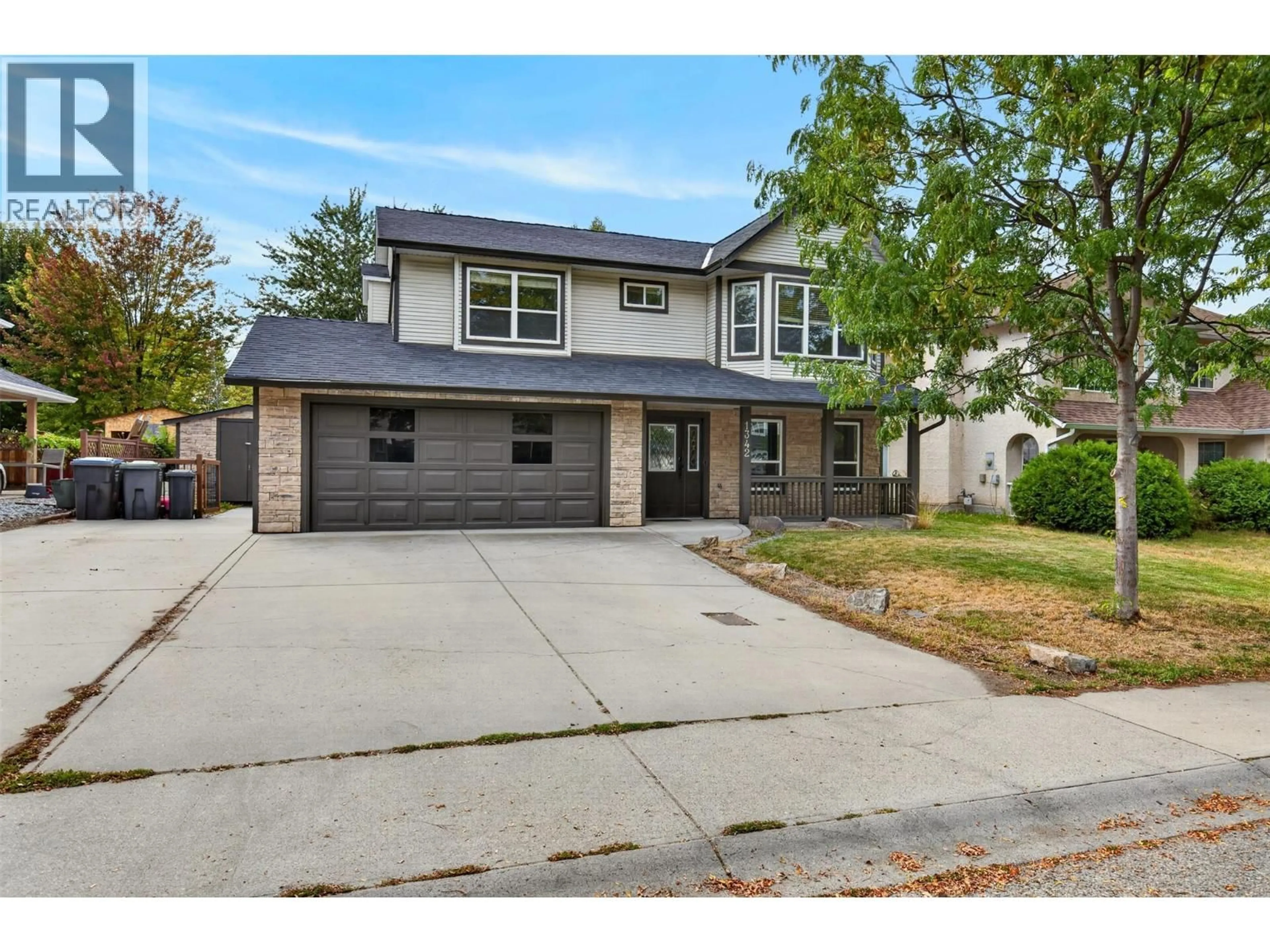 Home with brick exterior material, street for 1342 FRIESEN ROAD, Kelowna British Columbia V1X7P7