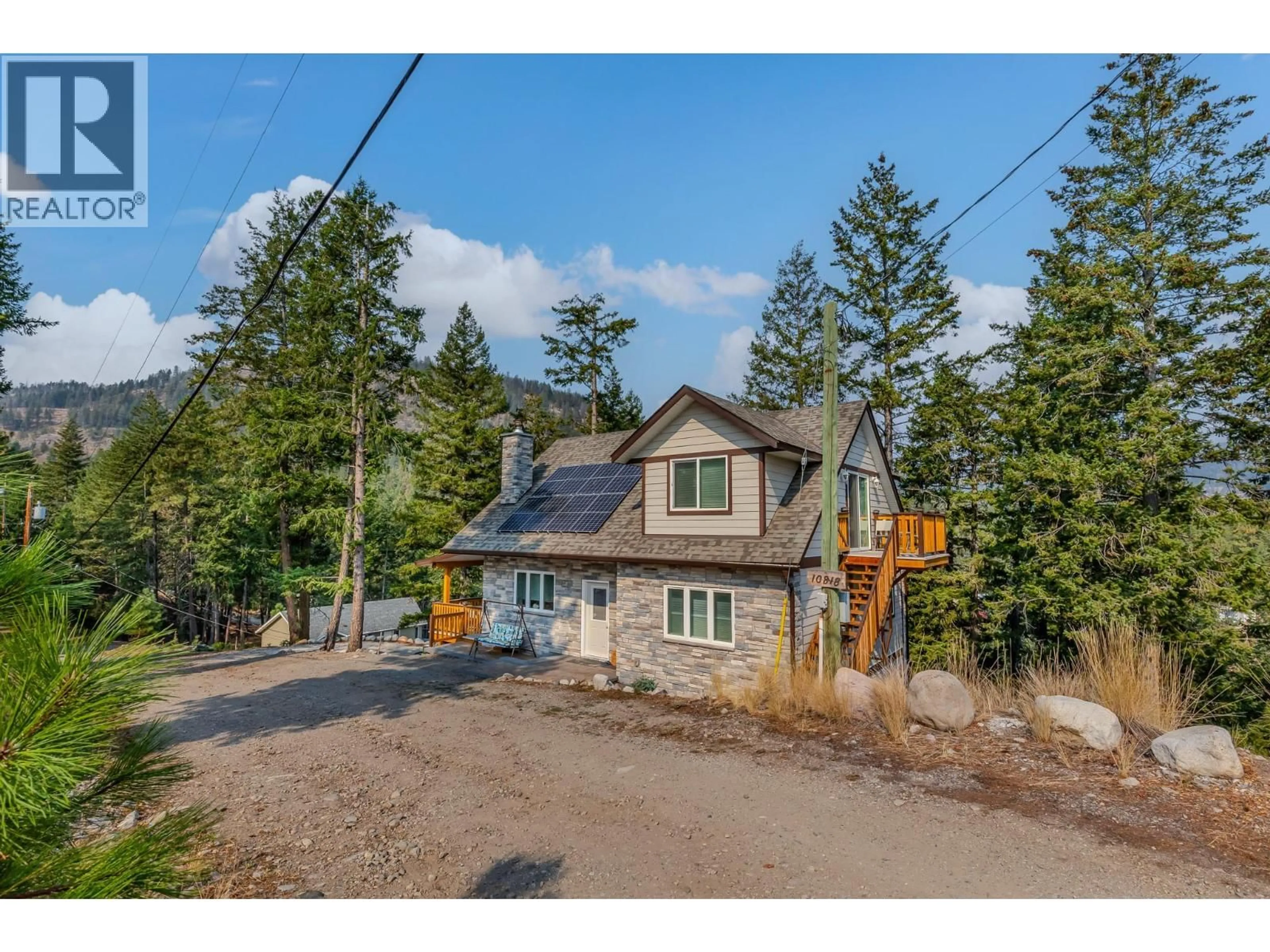 A pic from outside/outdoor area/front of a property/back of a property/a pic from drone, street for 10818 WESTSHORE ROAD, Vernon British Columbia V1H2C3