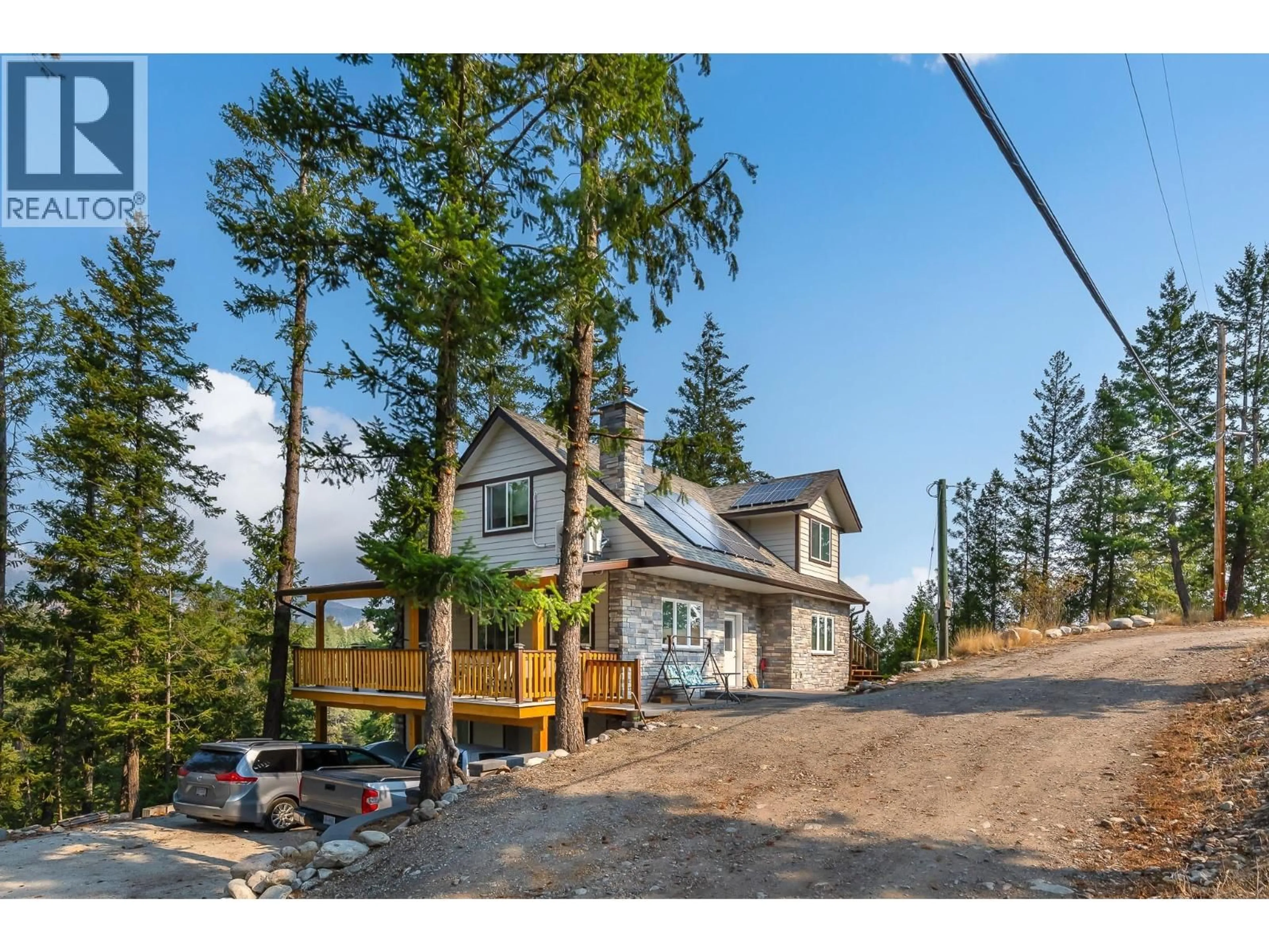 A pic from outside/outdoor area/front of a property/back of a property/a pic from drone, mountain view for 10818 WESTSHORE ROAD, Vernon British Columbia V1H2C3