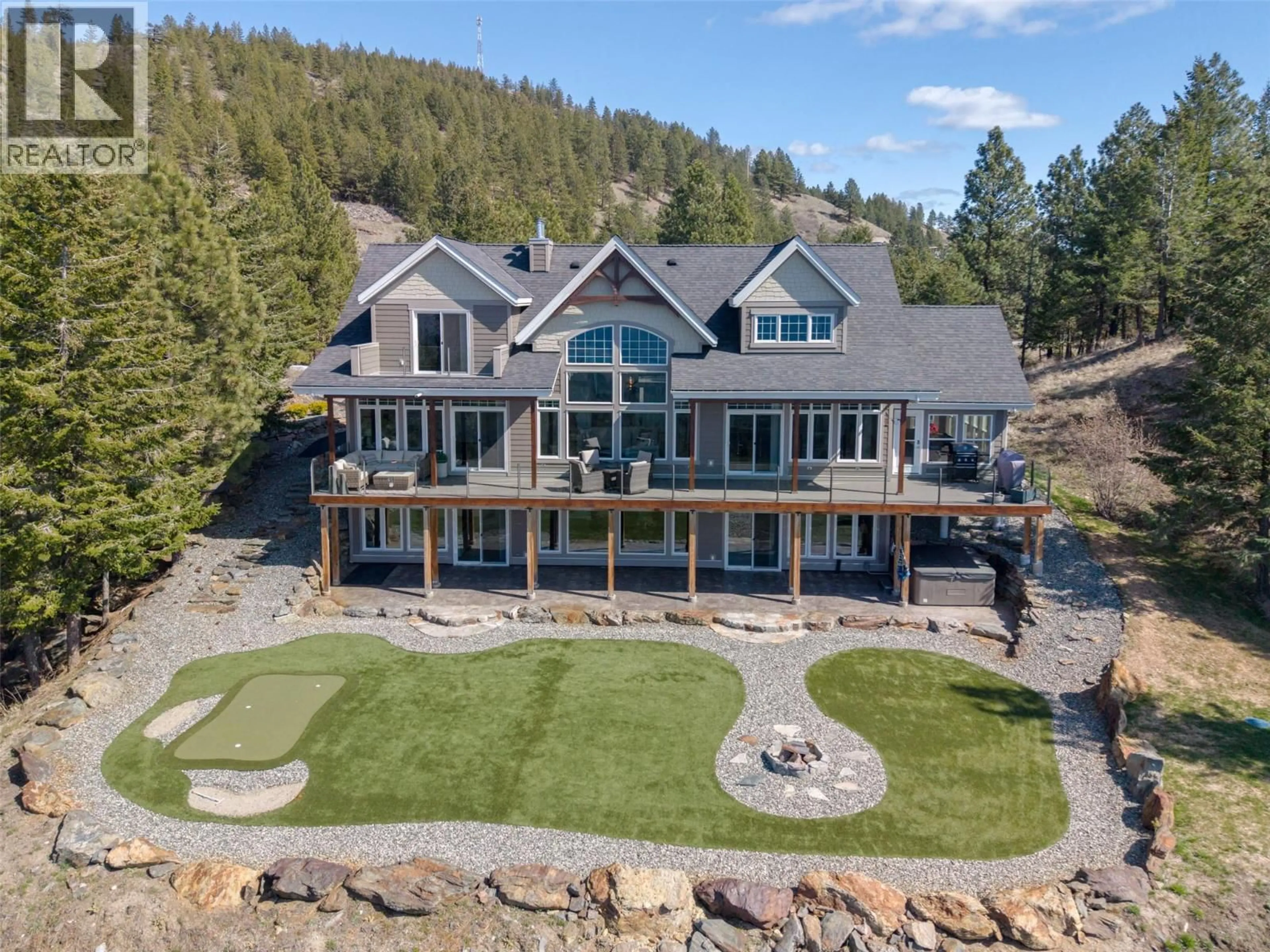 A pic from outside/outdoor area/front of a property/back of a property/a pic from drone, water/lake/river/ocean view for 560 SASQUATCH TRAIL, Osoyoos British Columbia V0H1V3