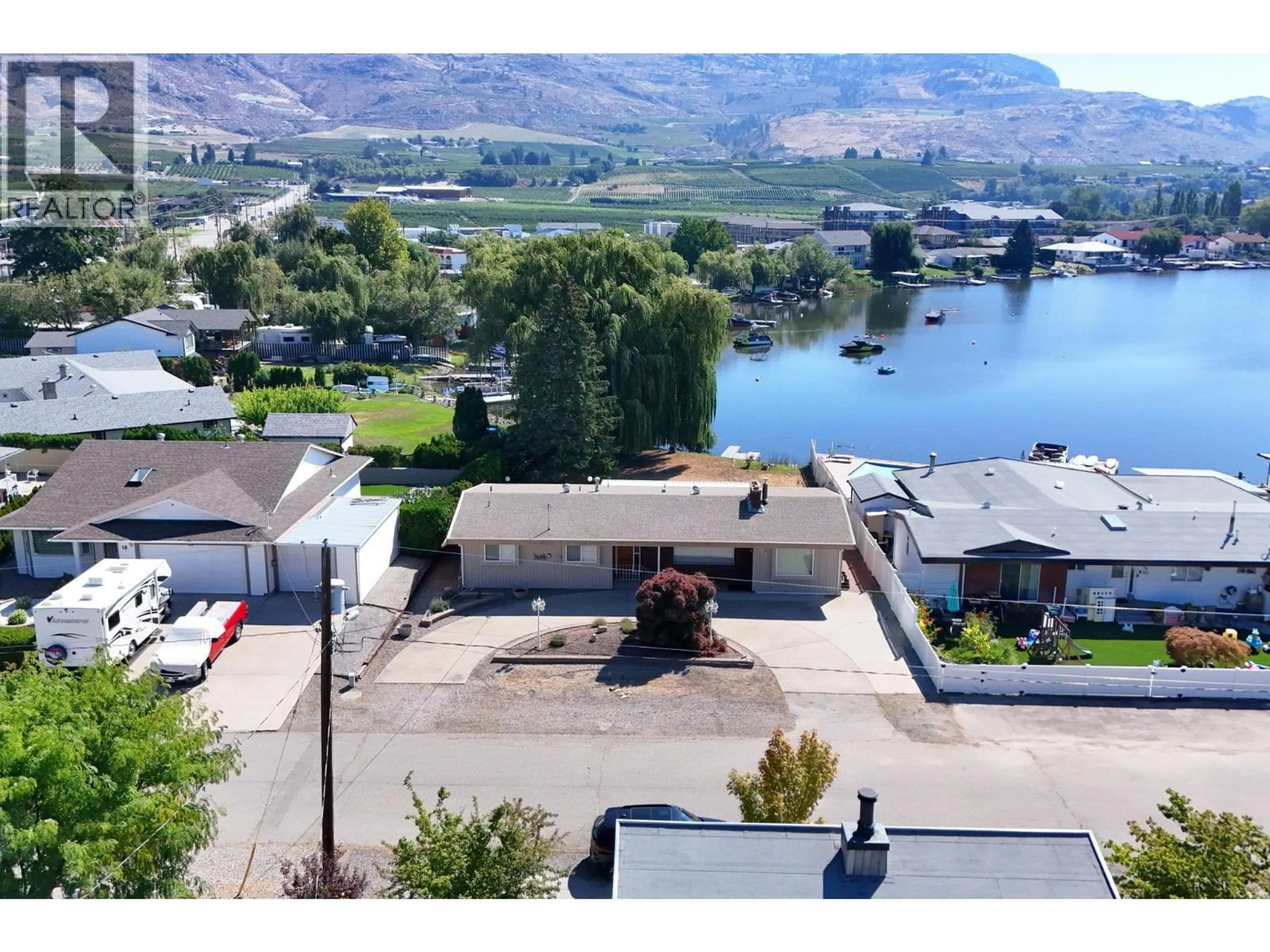 A pic from outside/outdoor area/front of a property/back of a property/a pic from drone, water/lake/river/ocean view for 22 SOLANA KEY COURT, Osoyoos British Columbia V0H1V3