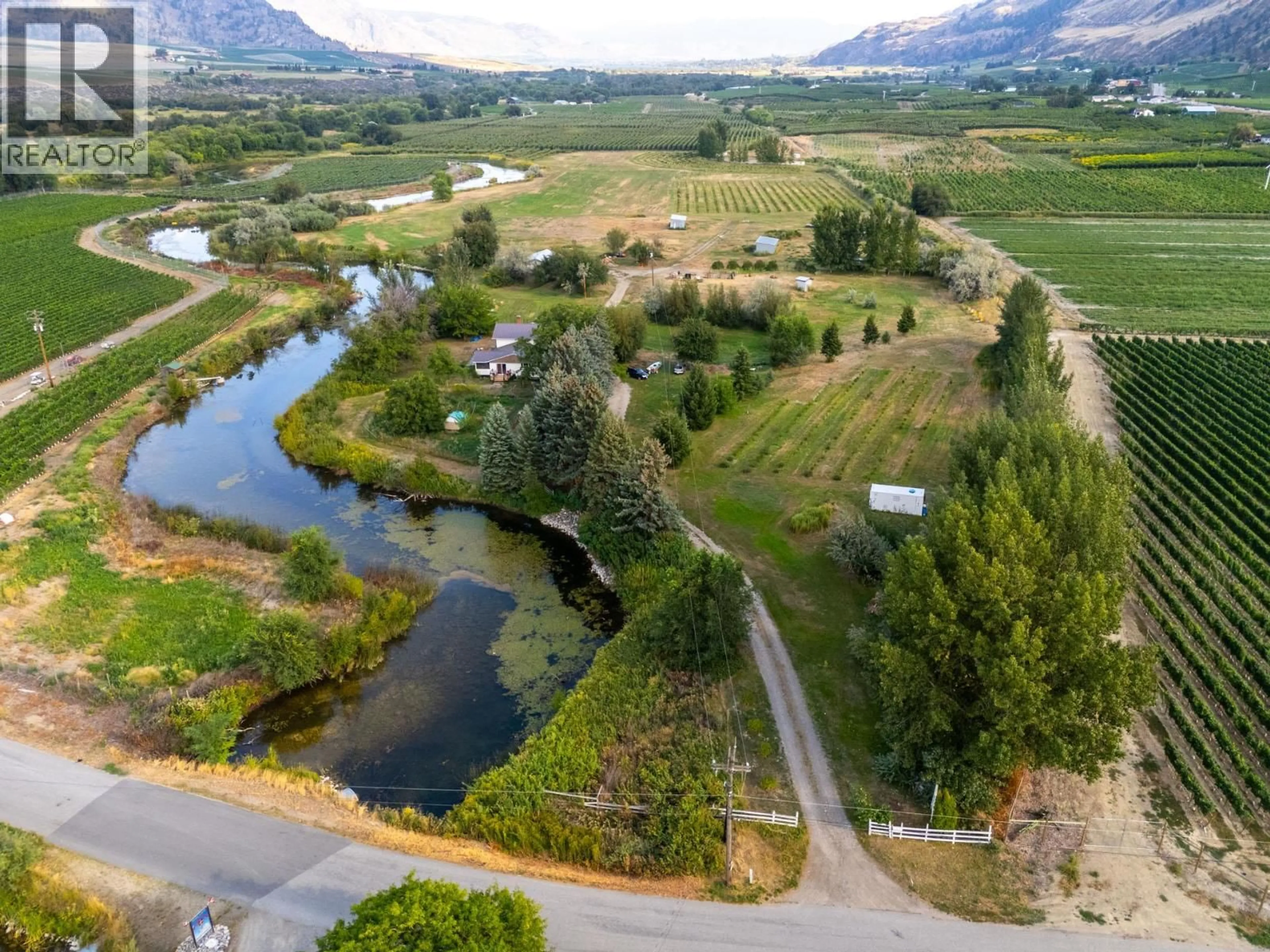 A pic from outside/outdoor area/front of a property/back of a property/a pic from drone, water/lake/river/ocean view for 294 ROAD 18 ROAD, Oliver British Columbia V0H1T1