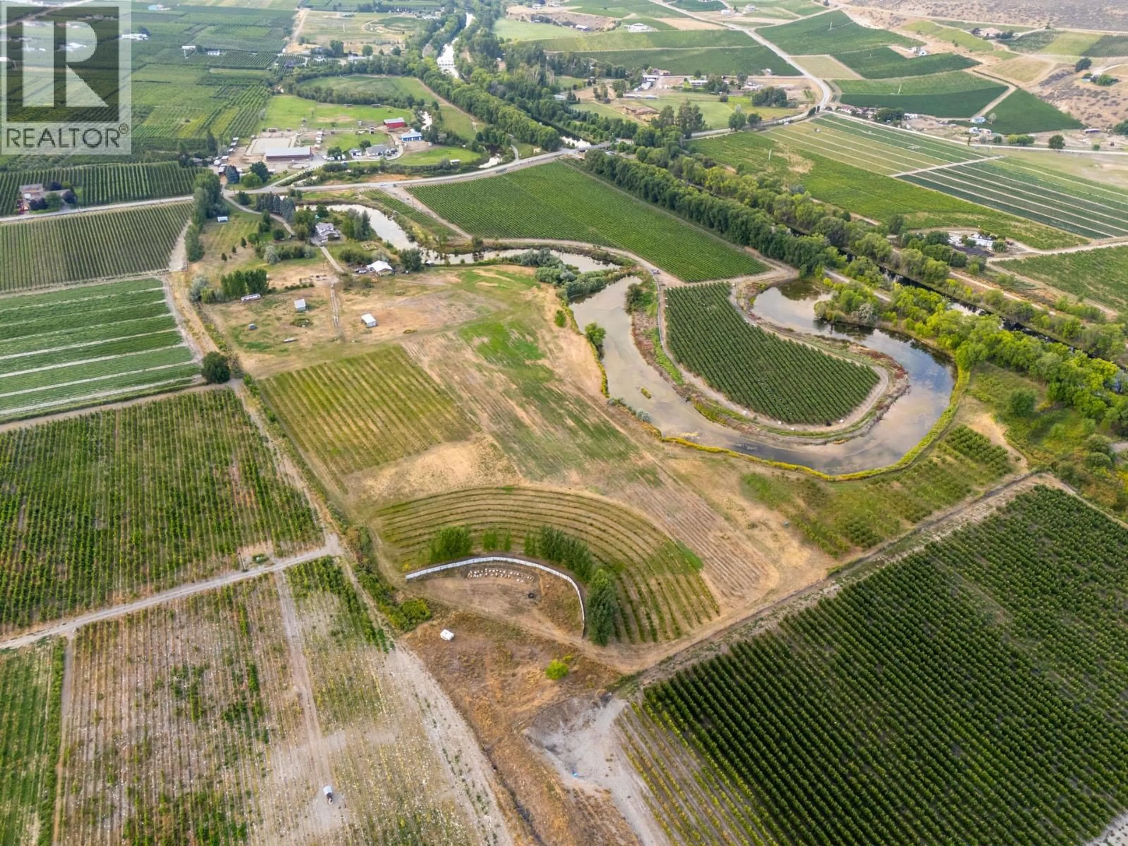 A pic from outside/outdoor area/front of a property/back of a property/a pic from drone, street for 294 ROAD 18 ROAD, Oliver British Columbia V0H1T1