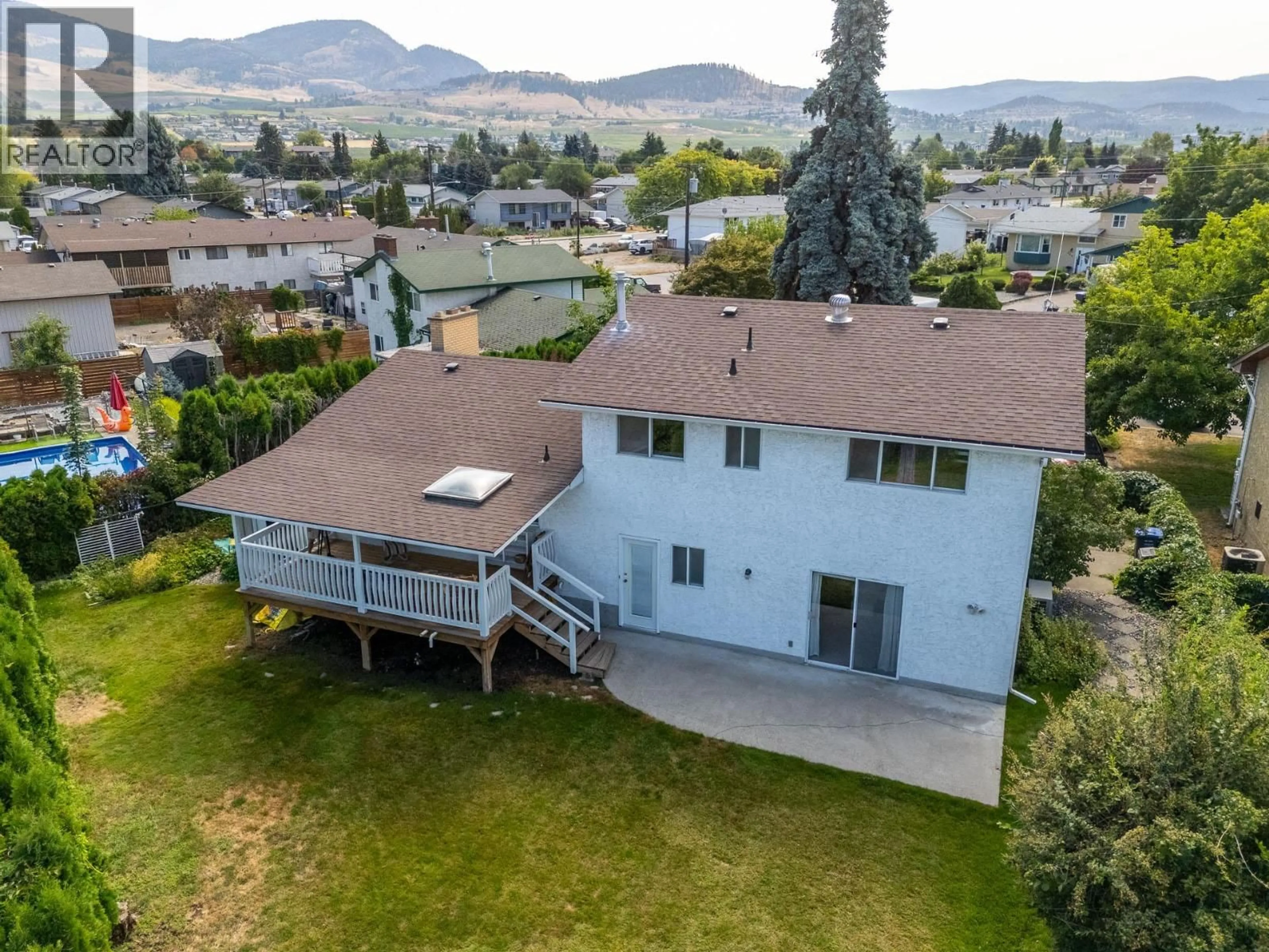 A pic from outside/outdoor area/front of a property/back of a property/a pic from drone, mountain view for 470 EUGENE ROAD, Kelowna British Columbia V1X2M4