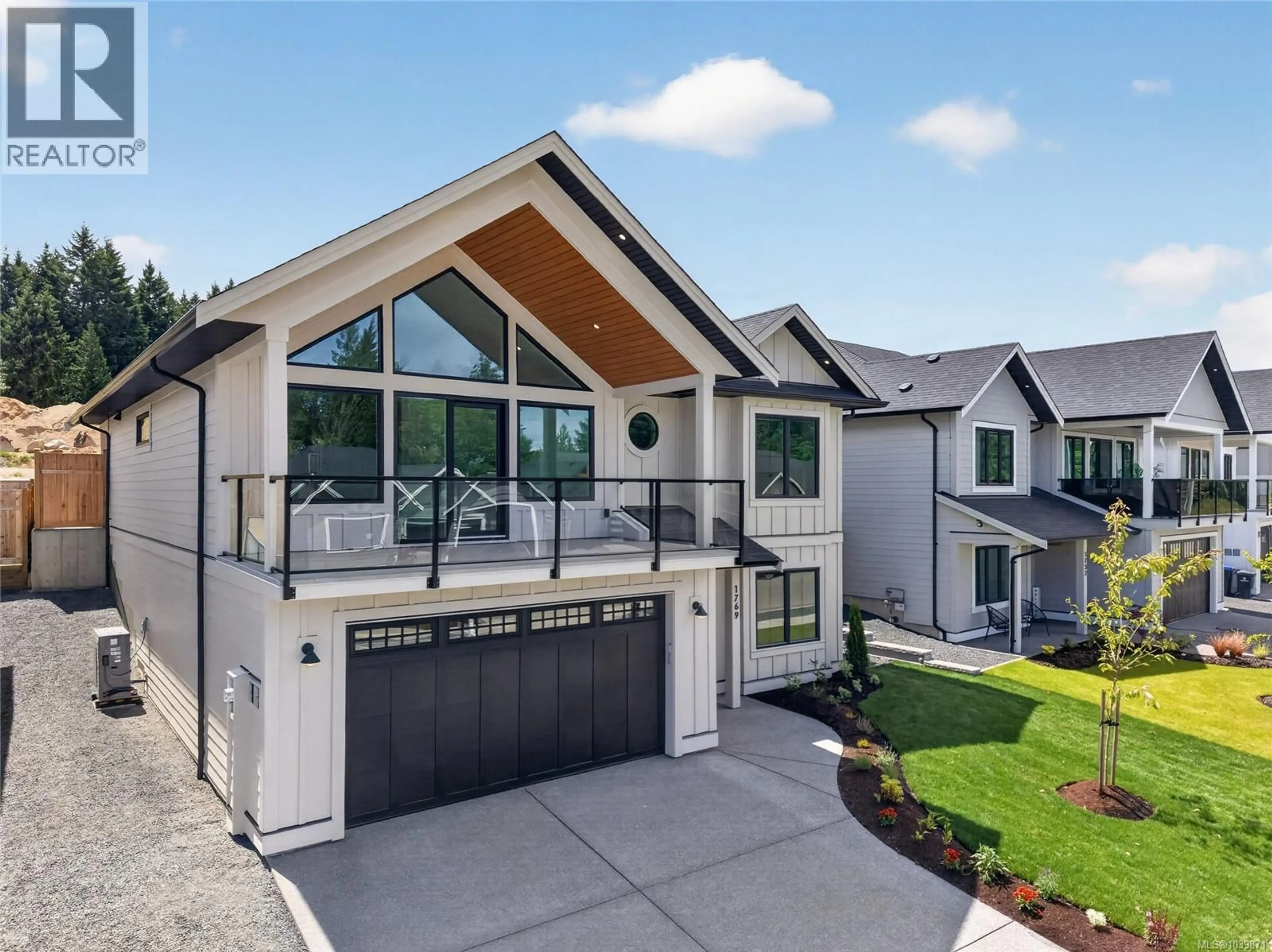 Home with brick exterior material, mountain view for 1769 CROWN ISLE BOULEVARD, Courtenay British Columbia V9N0K1