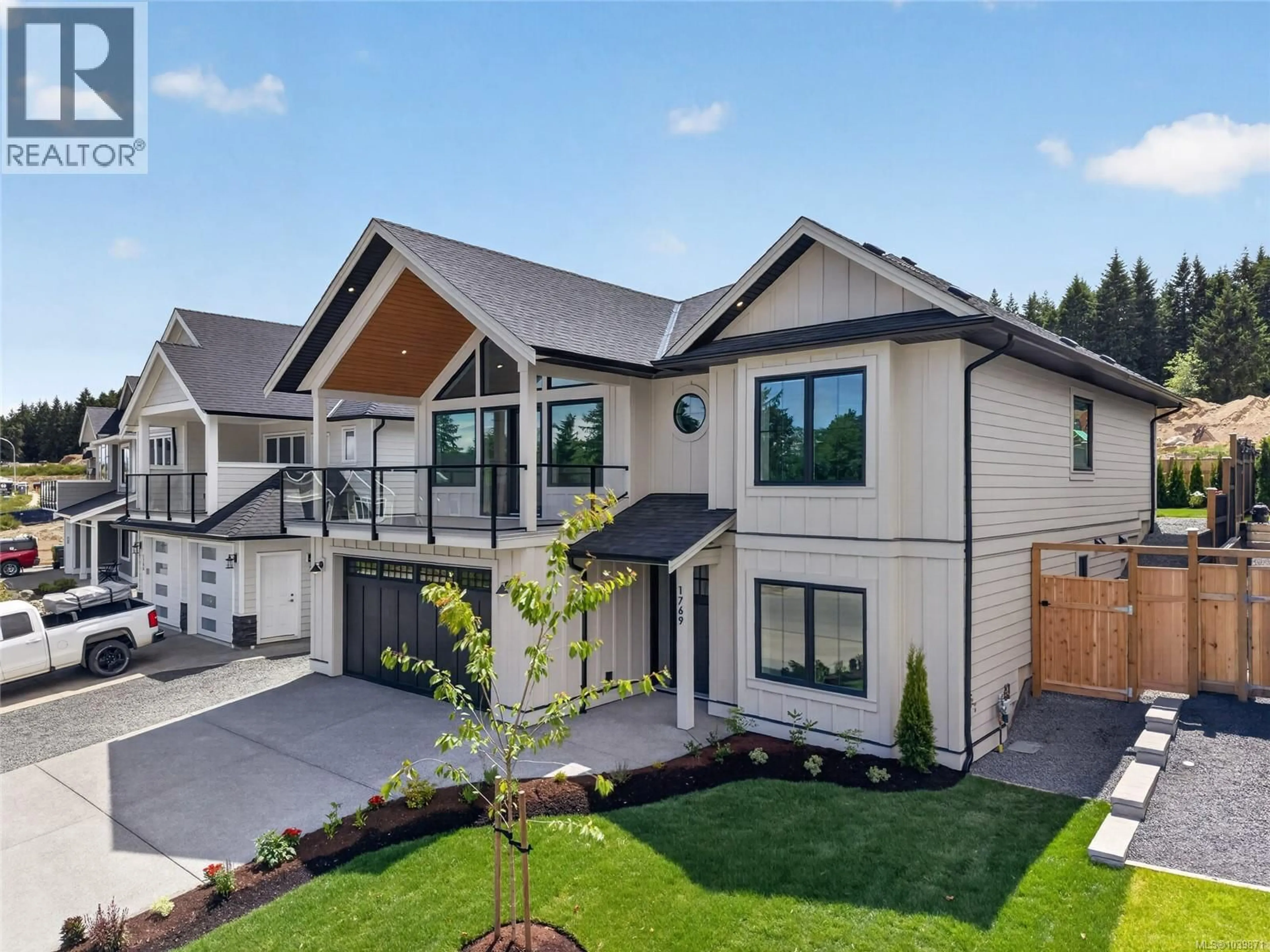Home with vinyl exterior material, mountain view for 1769 CROWN ISLE BOULEVARD, Courtenay British Columbia V9N0K1