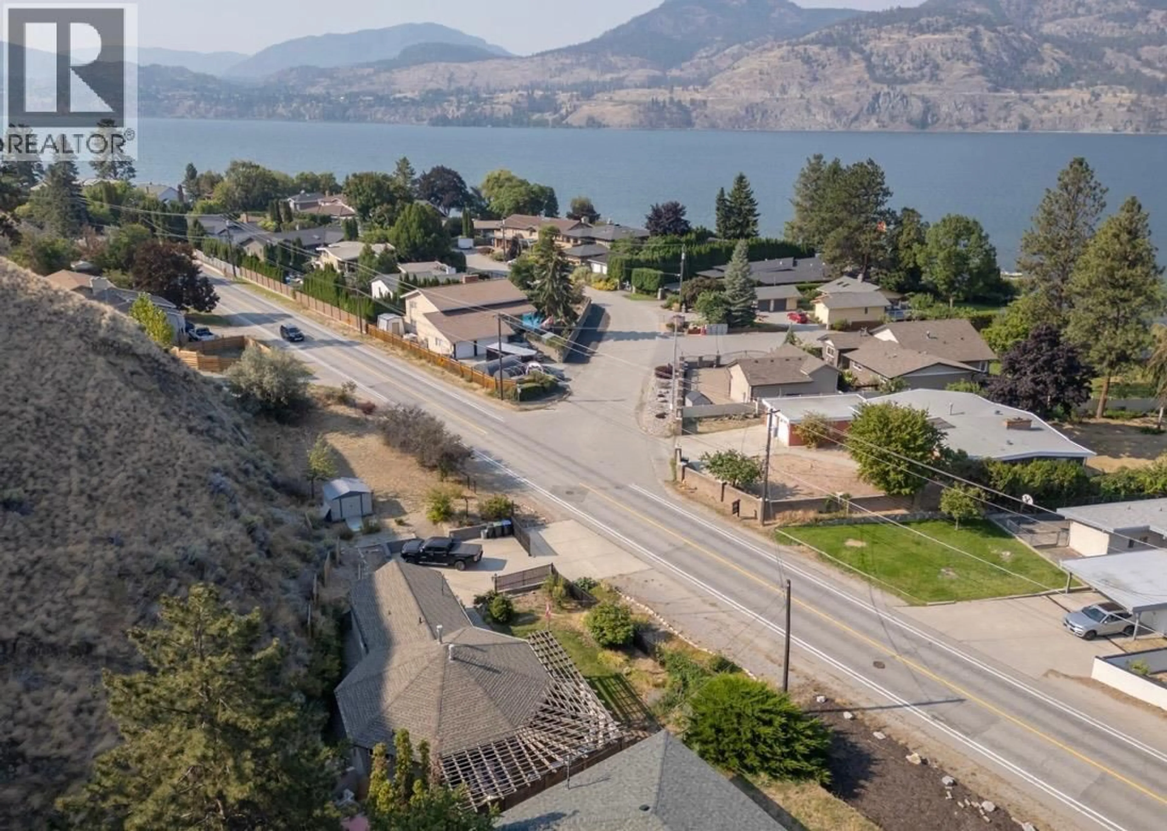 A pic from outside/outdoor area/front of a property/back of a property/a pic from drone, unknown for 4744 LAKESIDE ROAD, Penticton British Columbia V2A8W6
