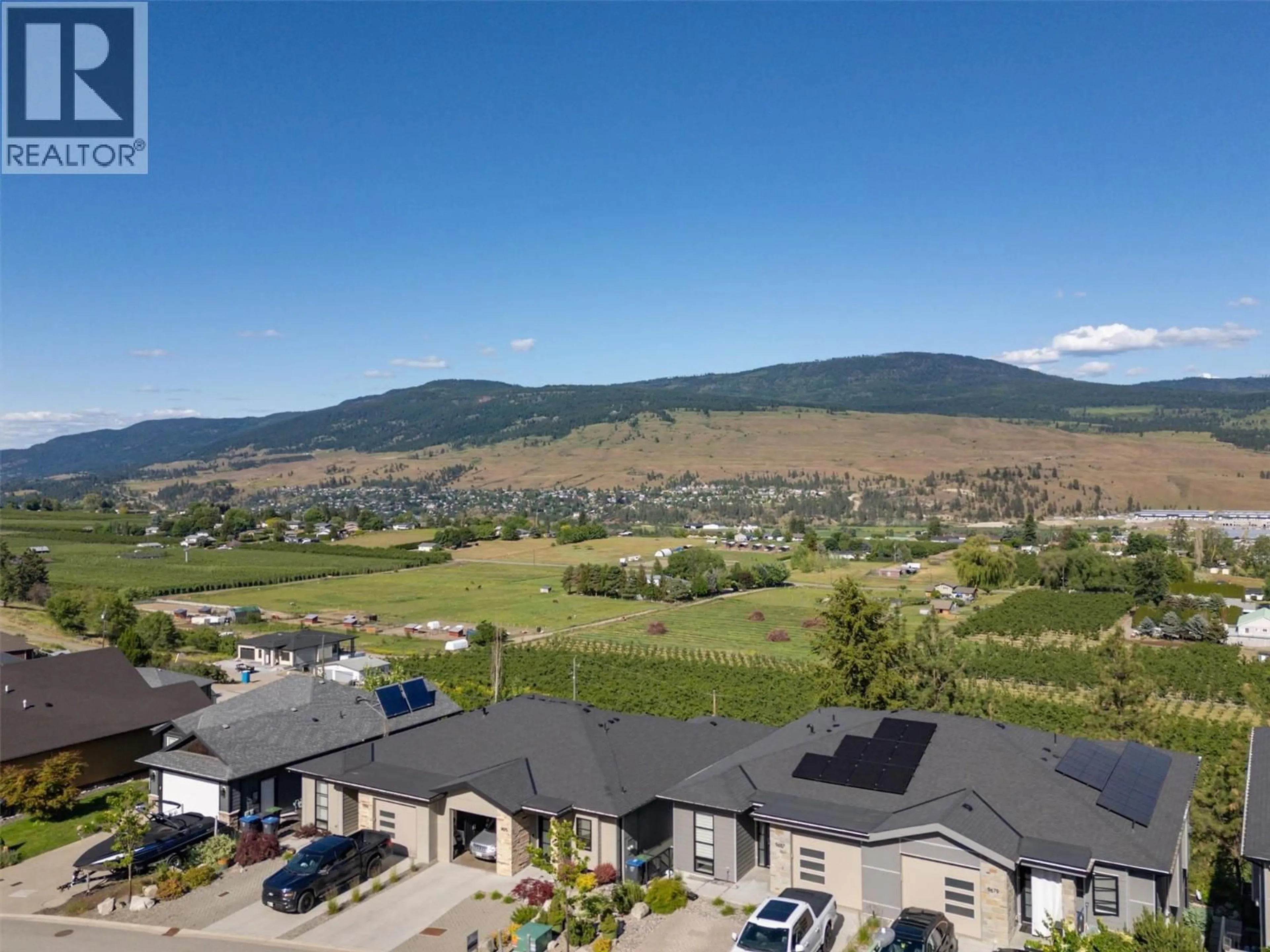 A pic from outside/outdoor area/front of a property/back of a property/a pic from drone, mountain view for 9659 SANTINA ROAD, Lake Country British Columbia V4V2R9