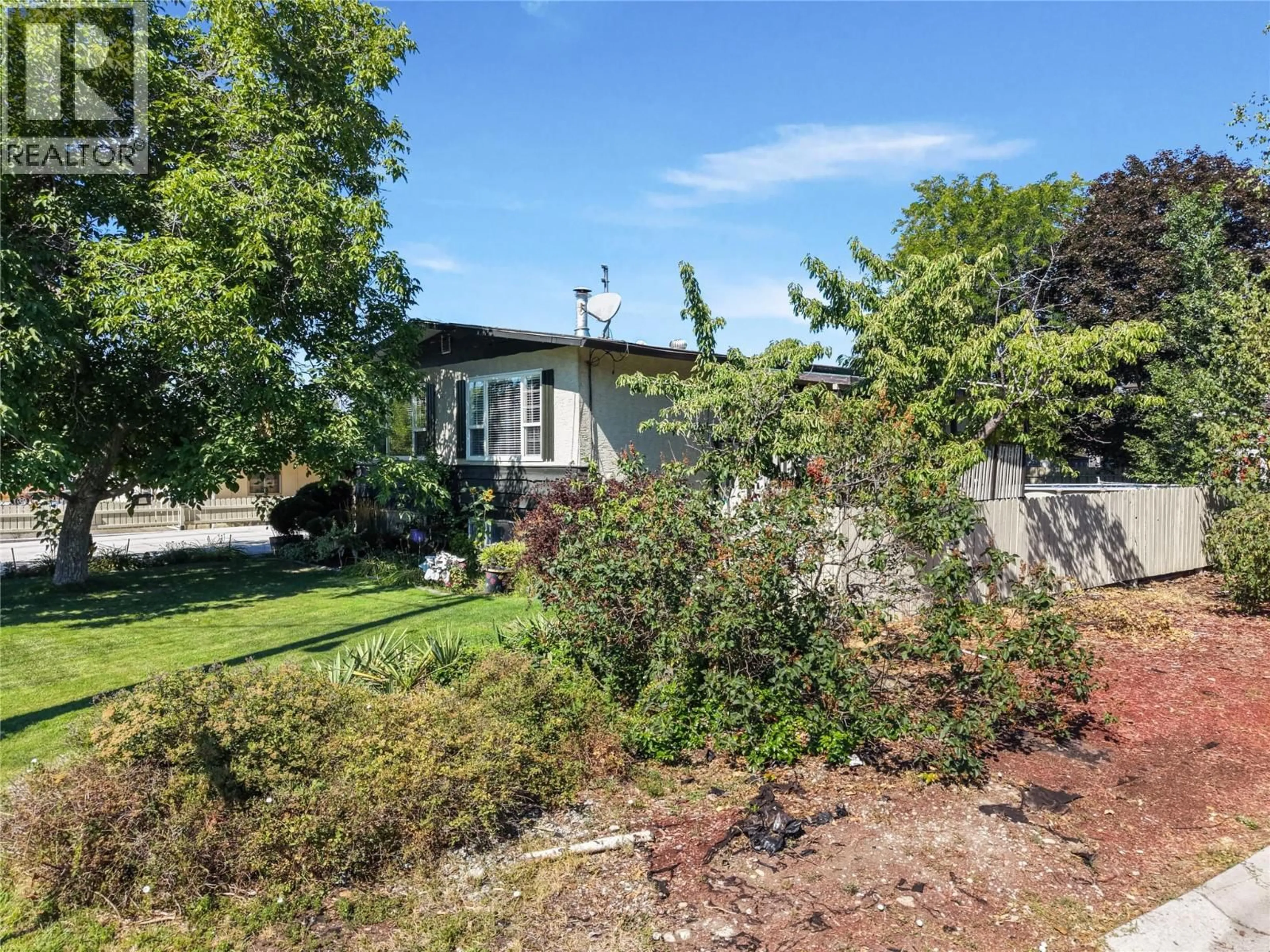 A pic from outside/outdoor area/front of a property/back of a property/a pic from drone, street for 1240 COLLISON ROAD, Kelowna British Columbia V1X1K6