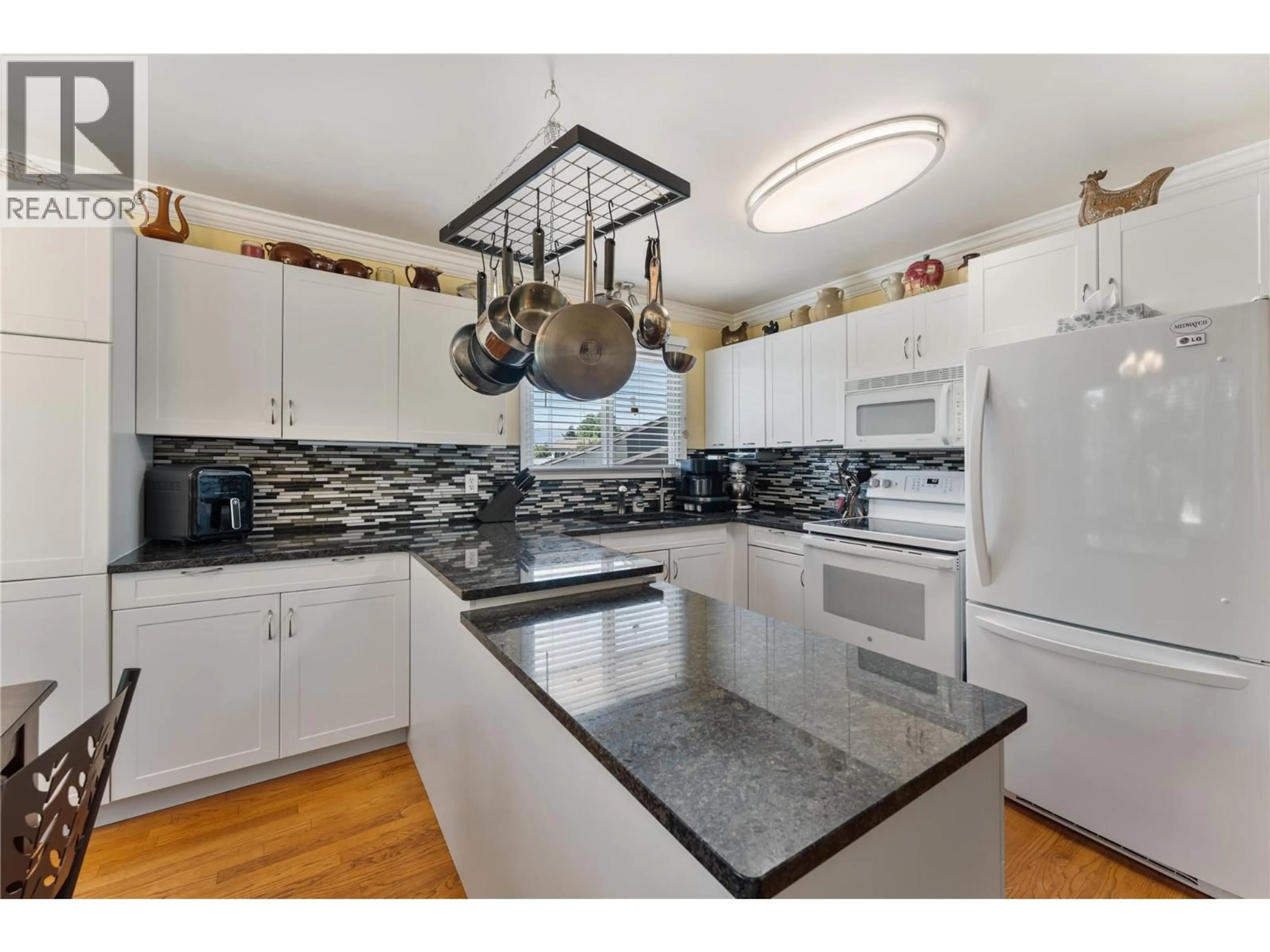 Open concept kitchen, unknown for 1240 COLLISON ROAD, Kelowna British Columbia V1X1K6