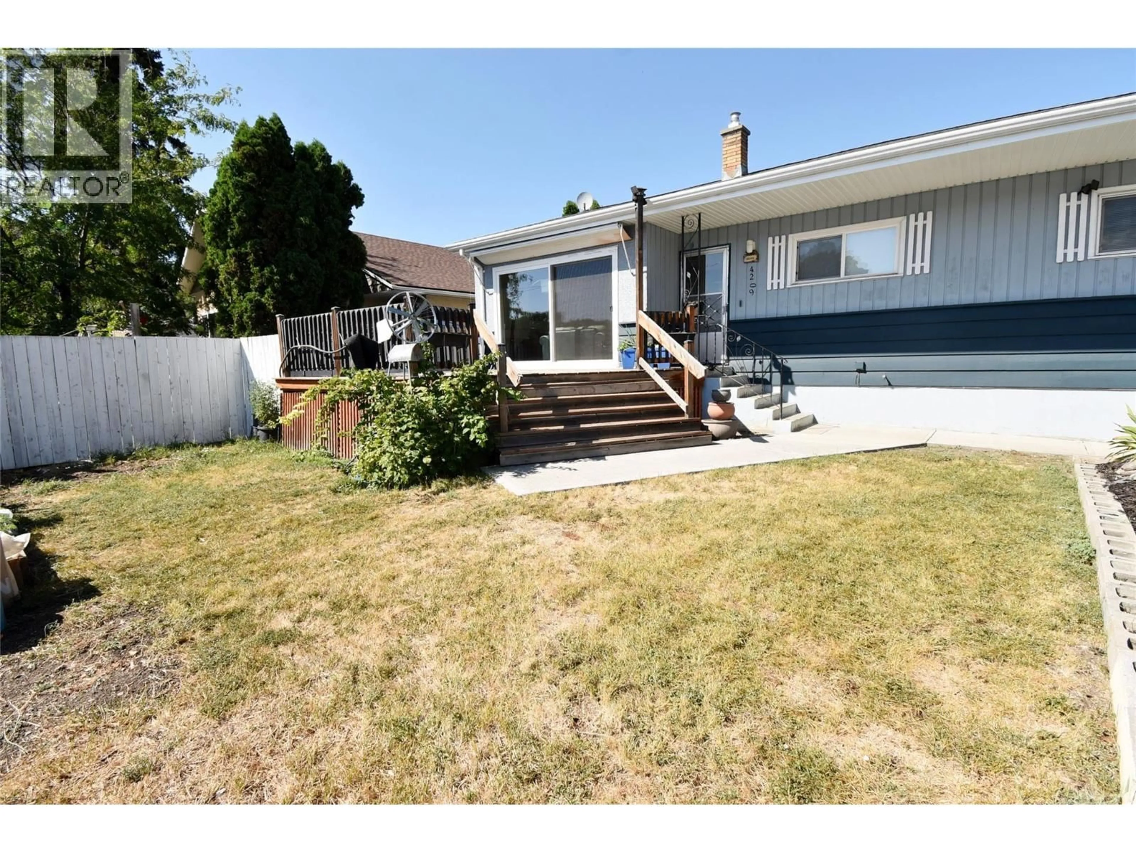 A pic from outside/outdoor area/front of a property/back of a property/a pic from drone, street for 4209 27TH AVENUE, Vernon British Columbia V1T1T3