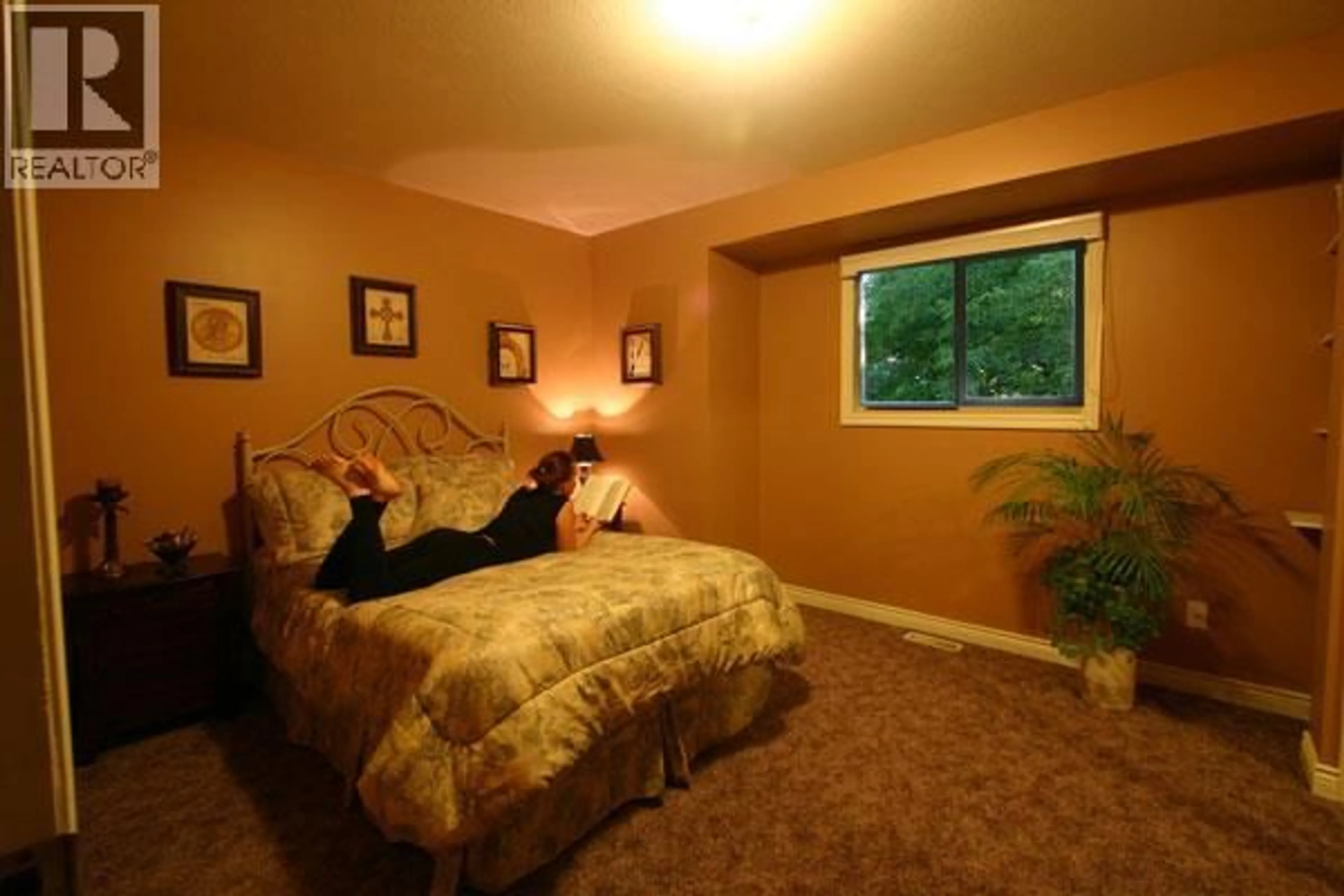 Bedroom with bed, carpet floor for 3525 LAKESHORE ROAD, Kelowna British Columbia V1W3K1