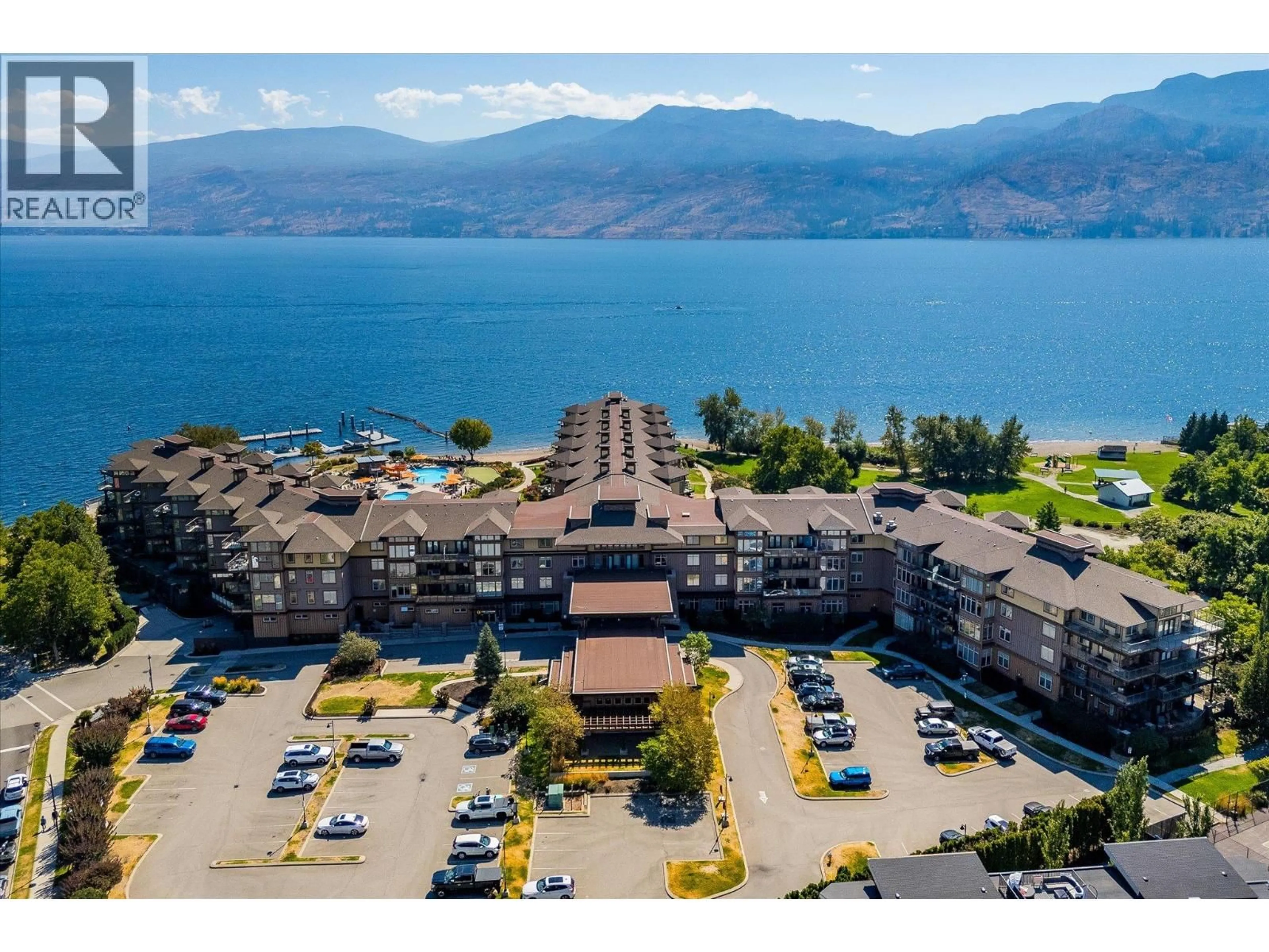 A pic from outside/outdoor area/front of a property/back of a property/a pic from drone, water/lake/river/ocean view for 407 - 4205 GELLATLY ROAD, West Kelowna British Columbia V4T2K2