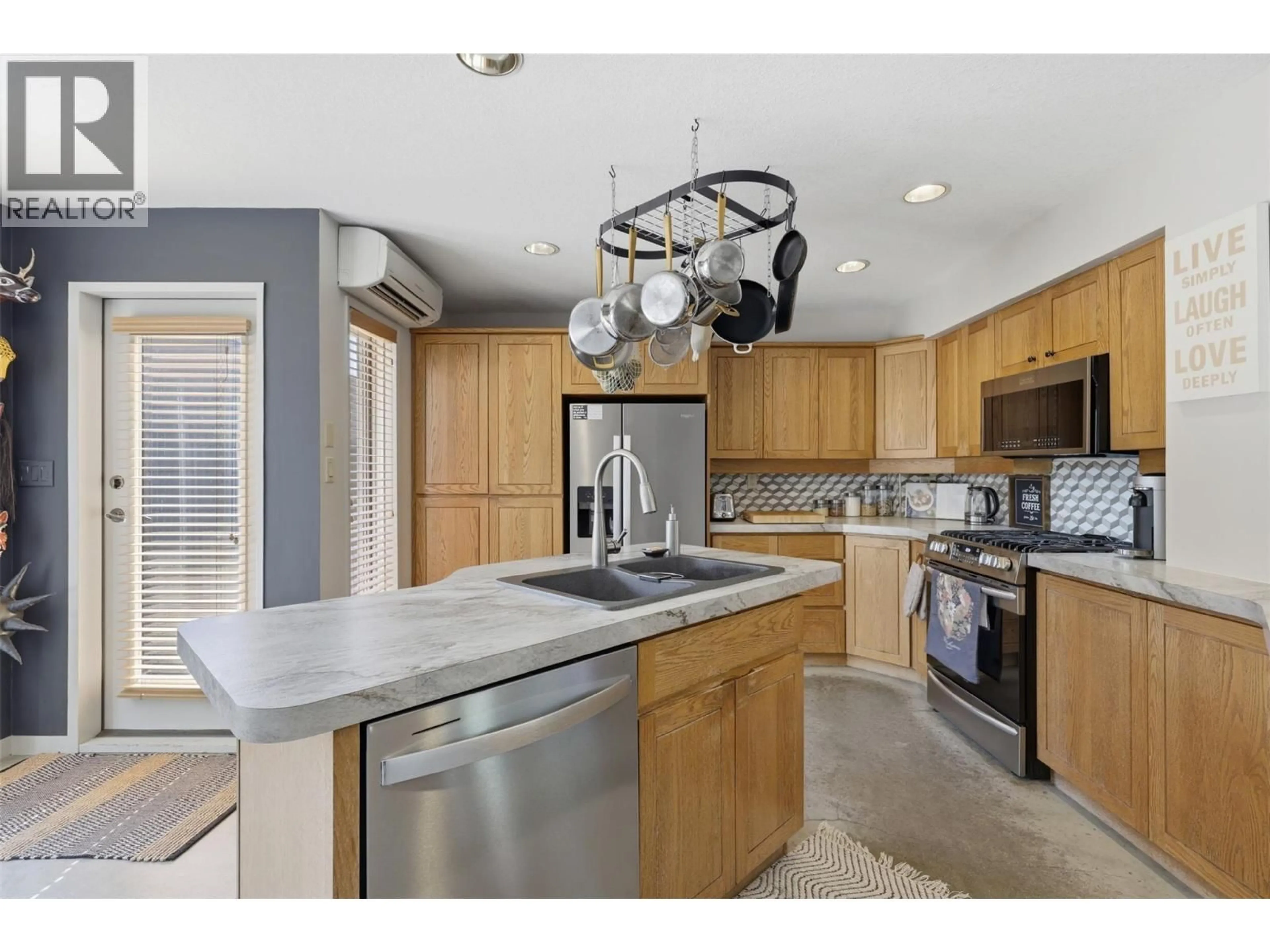 Open concept kitchen, ceramic/tile floor for 3769 NAVATANEE DRIVE, Kamloops British Columbia V2H1S1