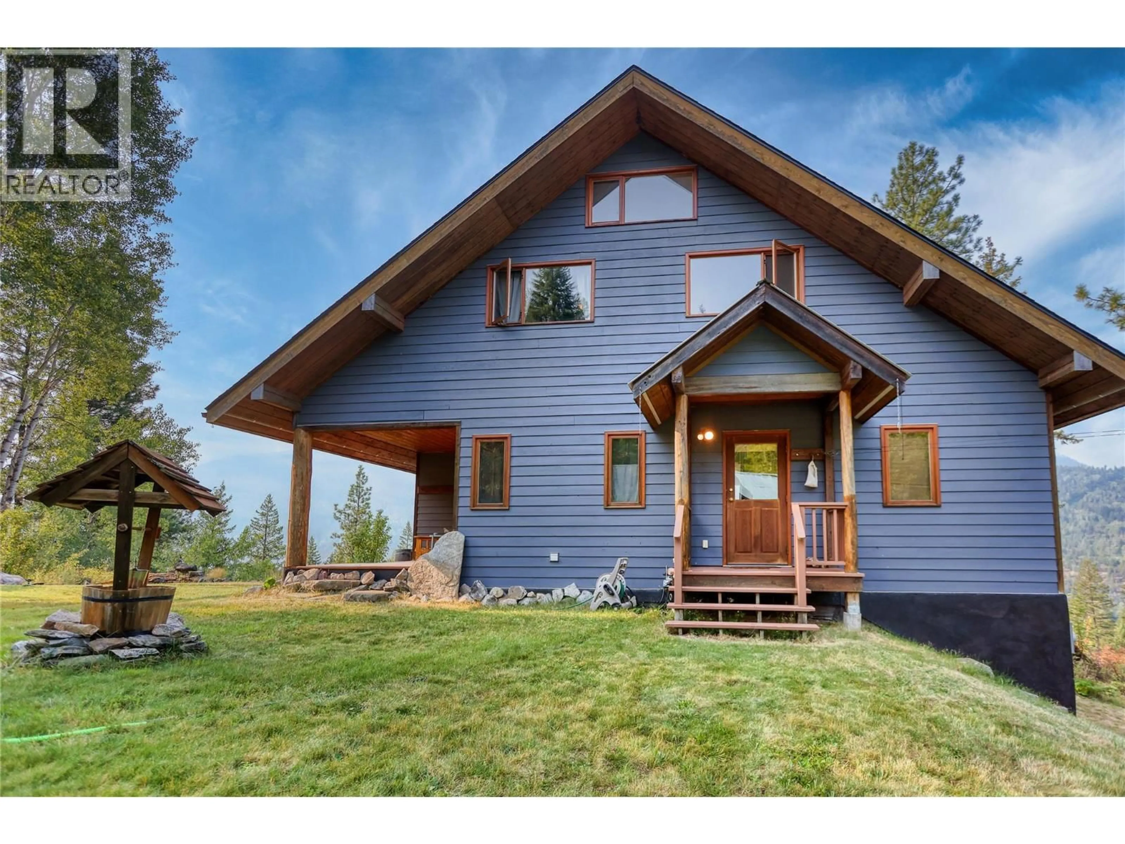 Home with vinyl exterior material, mountain view for 220 GROHMAN CREEK ROAD, Nelson British Columbia V1L5P3
