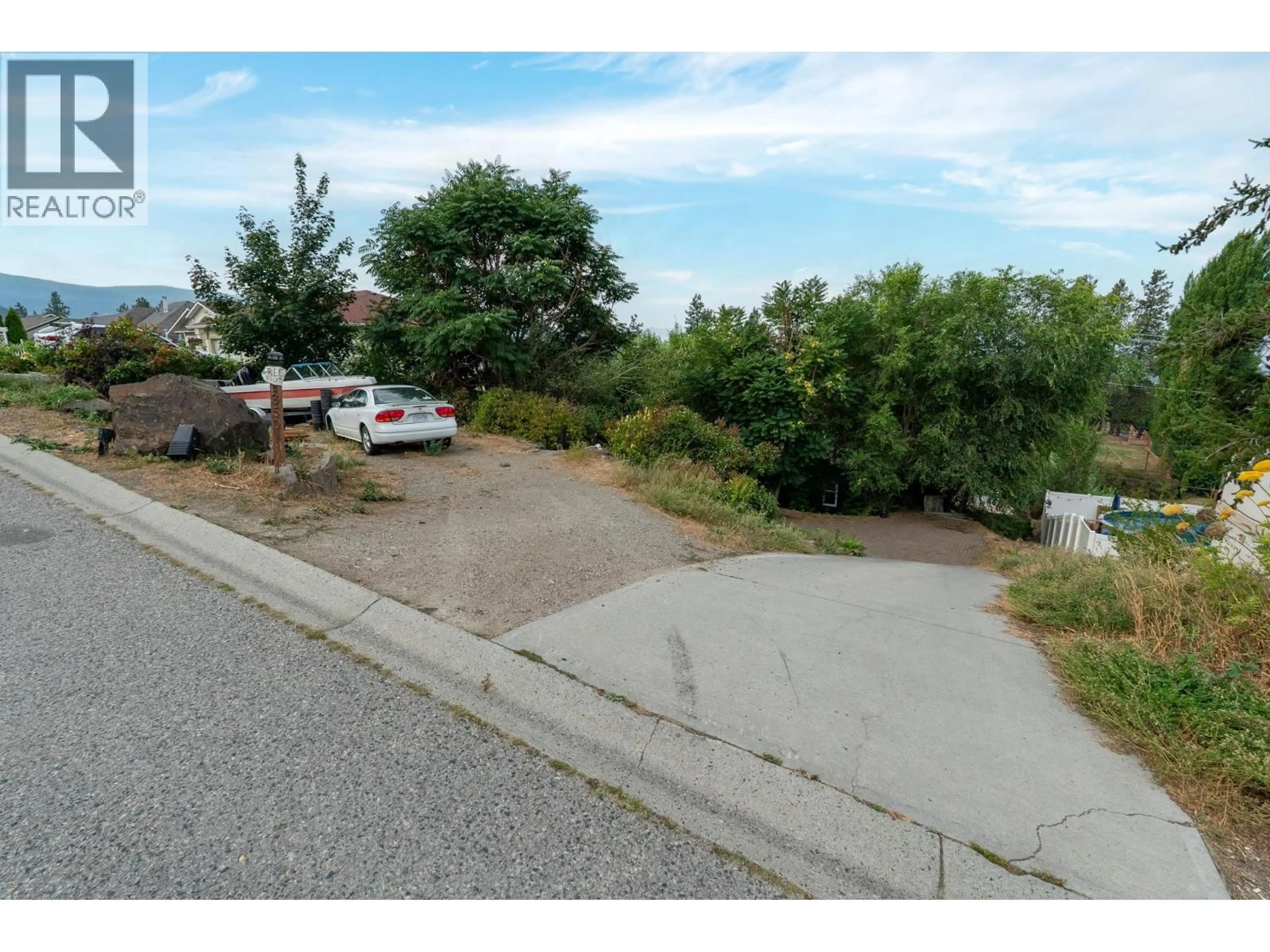 A pic from outside/outdoor area/front of a property/back of a property/a pic from drone, unknown for 1350 BENTIEN ROAD, Kelowna British Columbia V1X7K3