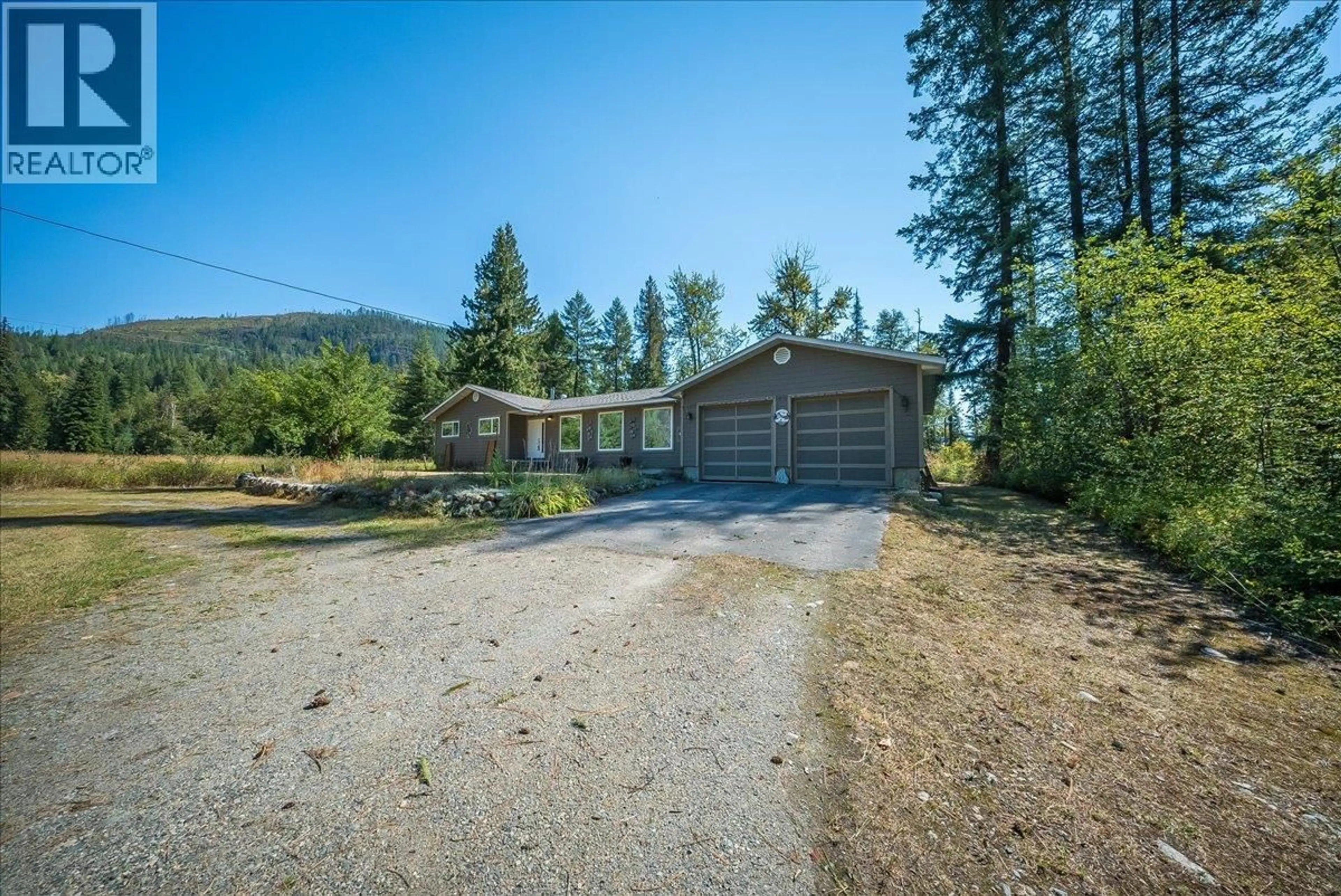 A pic from outside/outdoor area/front of a property/back of a property/a pic from drone, mountain view for 317 ROSE ROAD, Salmo British Columbia V0G1Z0
