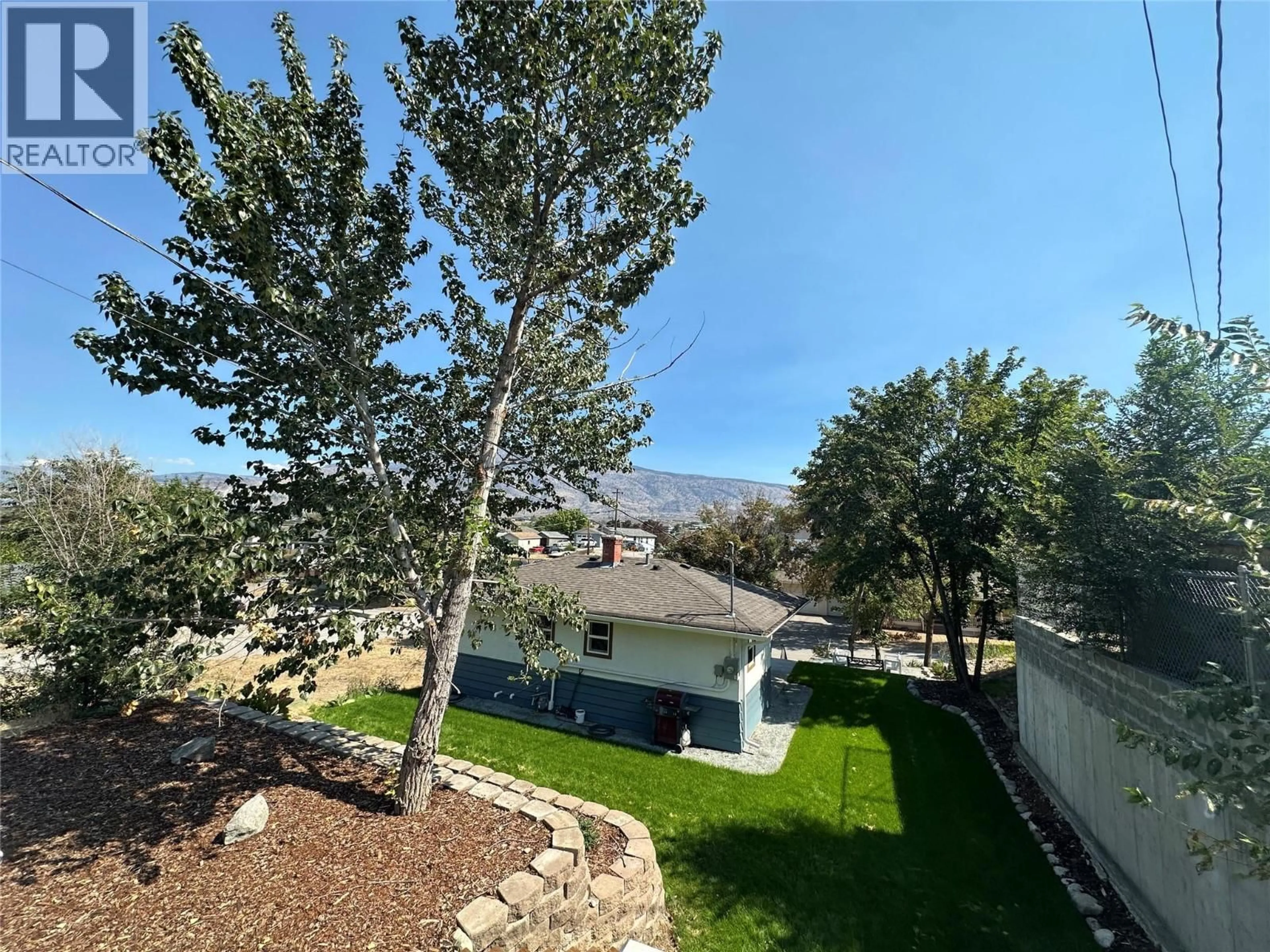 A pic from outside/outdoor area/front of a property/back of a property/a pic from drone, unknown for 6470 HOLLOW STREET, Oliver British Columbia V0H1T0