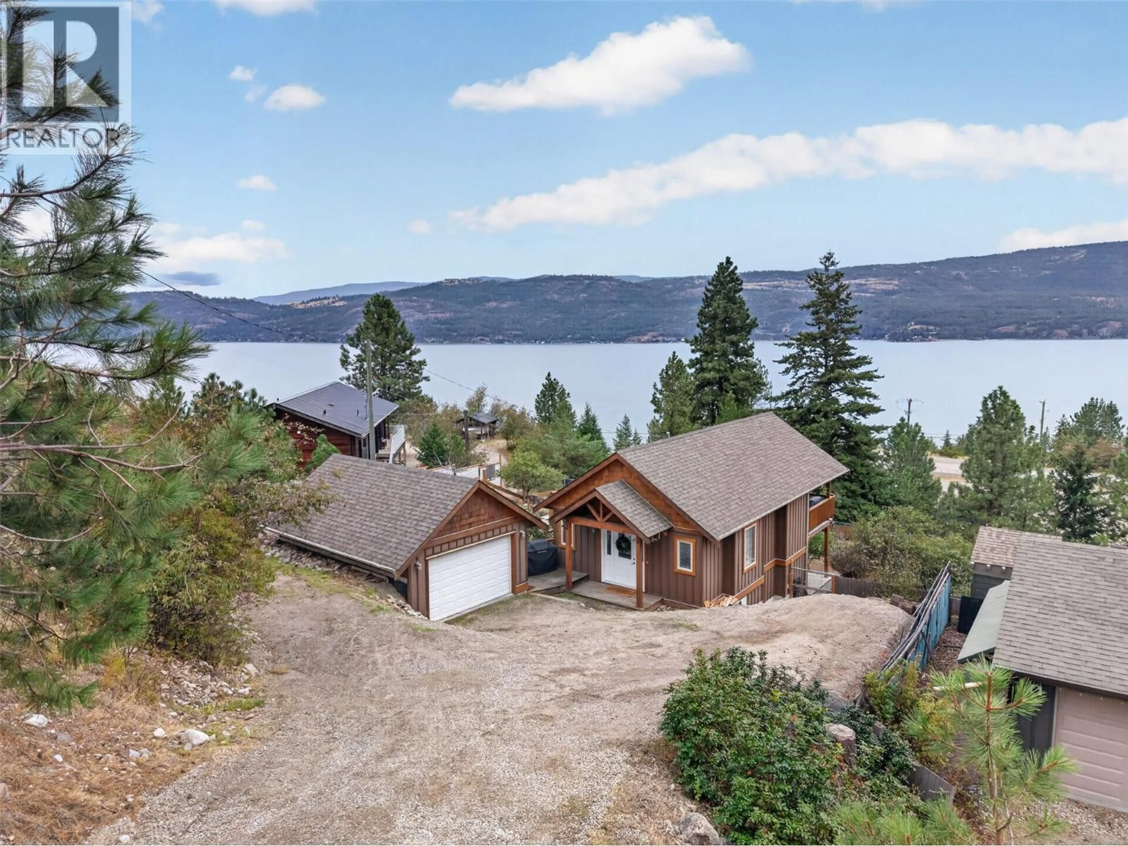 A pic from outside/outdoor area/front of a property/back of a property/a pic from drone, water/lake/river/ocean view for 10375 WESTSHORE ROAD, Vernon British Columbia V1H2B1