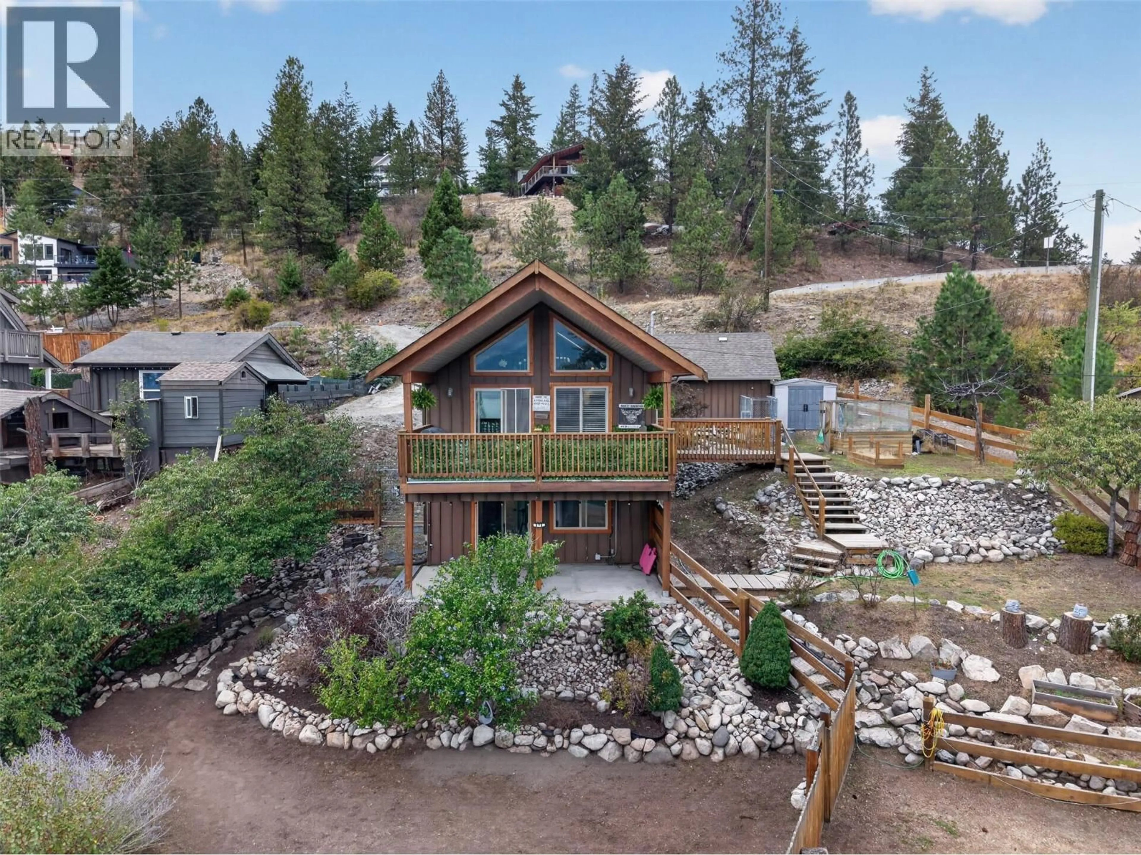 A pic from outside/outdoor area/front of a property/back of a property/a pic from drone, water/lake/river/ocean view for 10375 WESTSHORE ROAD, Vernon British Columbia V1H2B1