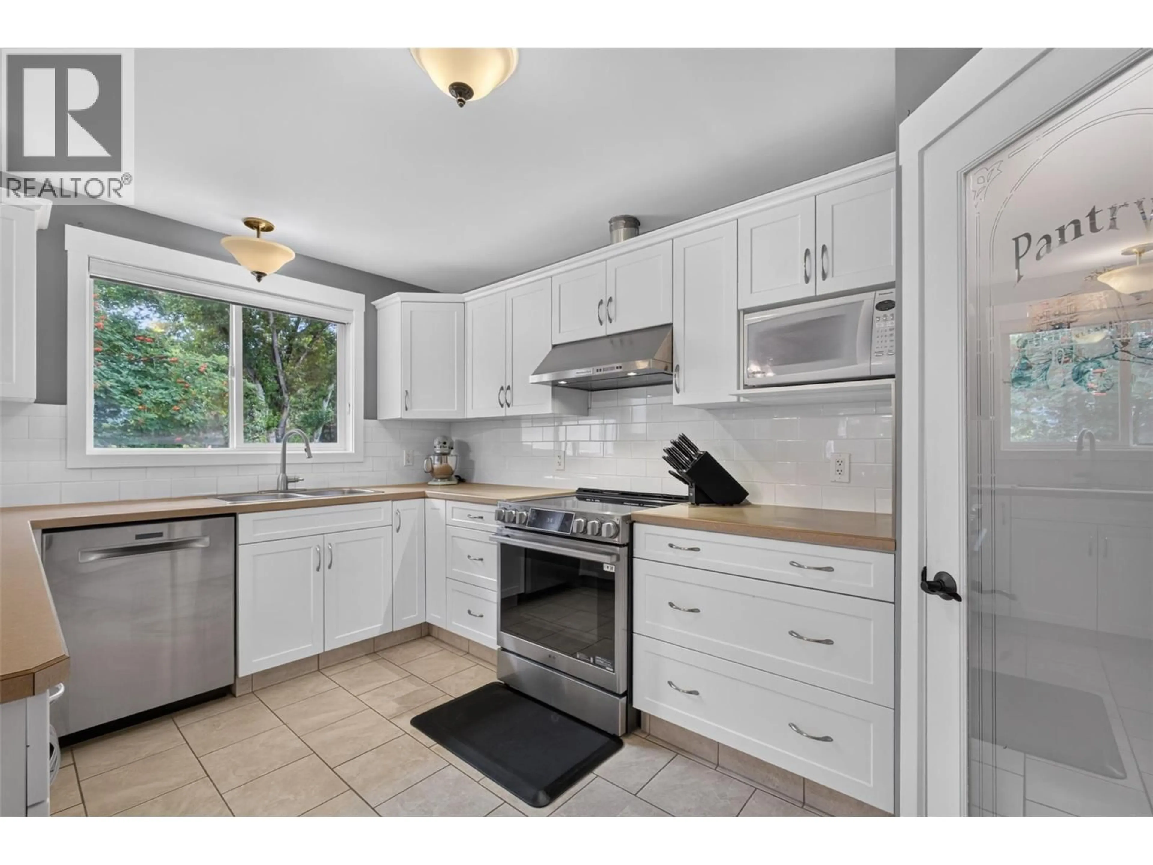 Standard kitchen, ceramic/tile floor for 1659 SANTA ROSA ROAD, Christina Lake British Columbia V0H1E3
