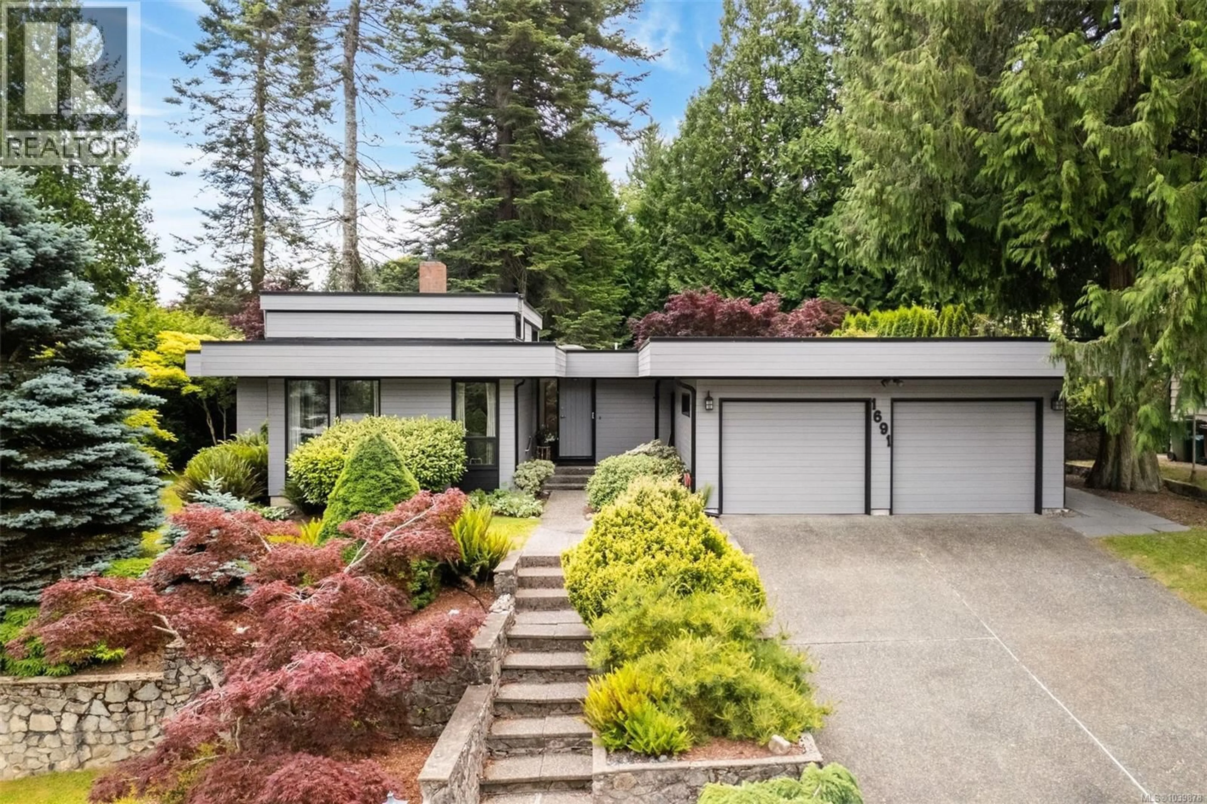 Home with vinyl exterior material, street for 1691 CRESSWELL DRIVE, North Saanich British Columbia V8L4L4