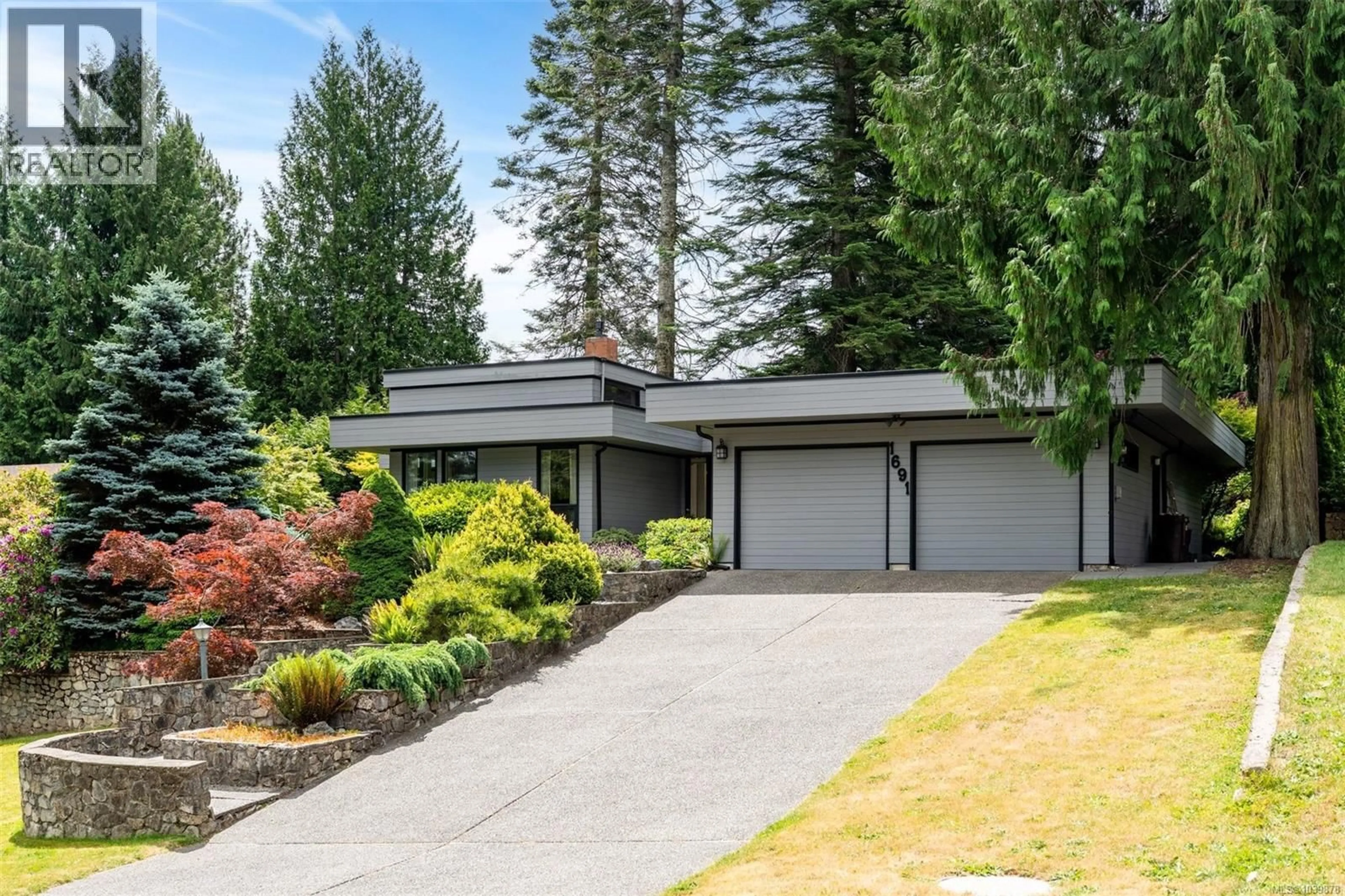 Home with vinyl exterior material, street for 1691 CRESSWELL DRIVE, North Saanich British Columbia V8L4L4