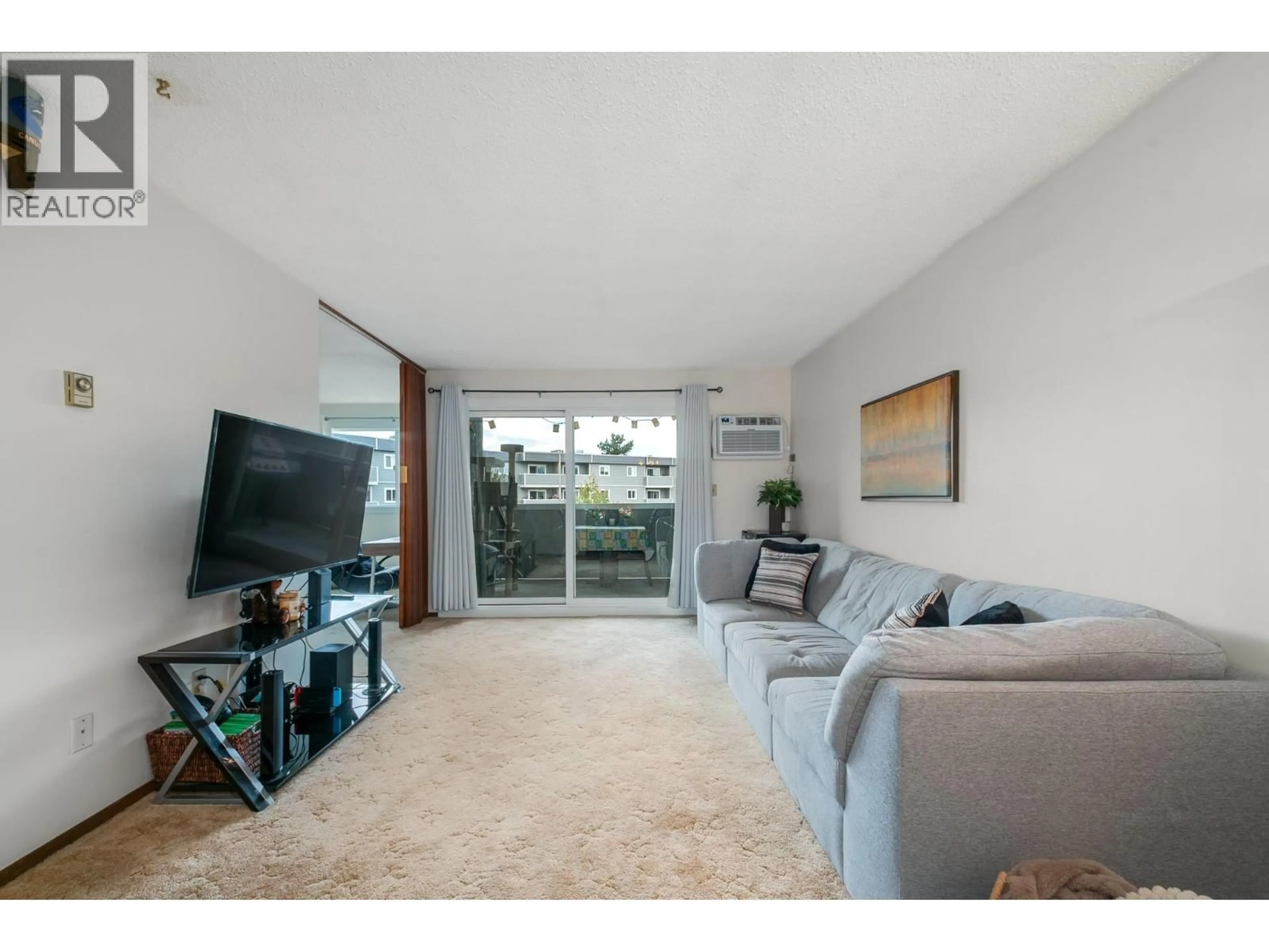 Living room with furniture, unknown for 327 - 495 ALL STAR COURT, Kelowna British Columbia V1X5N7