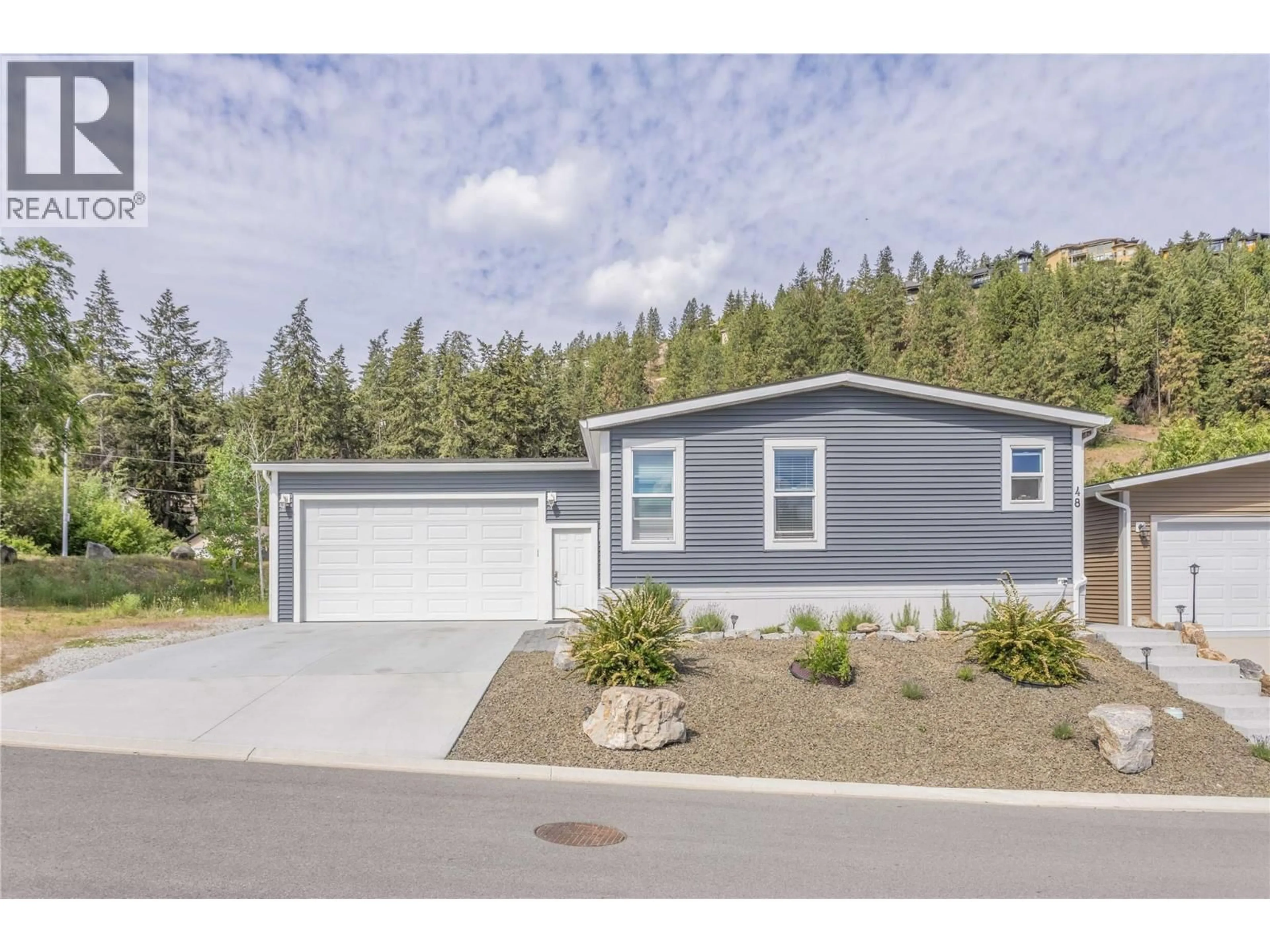 Home with vinyl exterior material, street for 48 - 1835 NANCEE WAY COURT, Kelowna British Columbia V1Z4C1