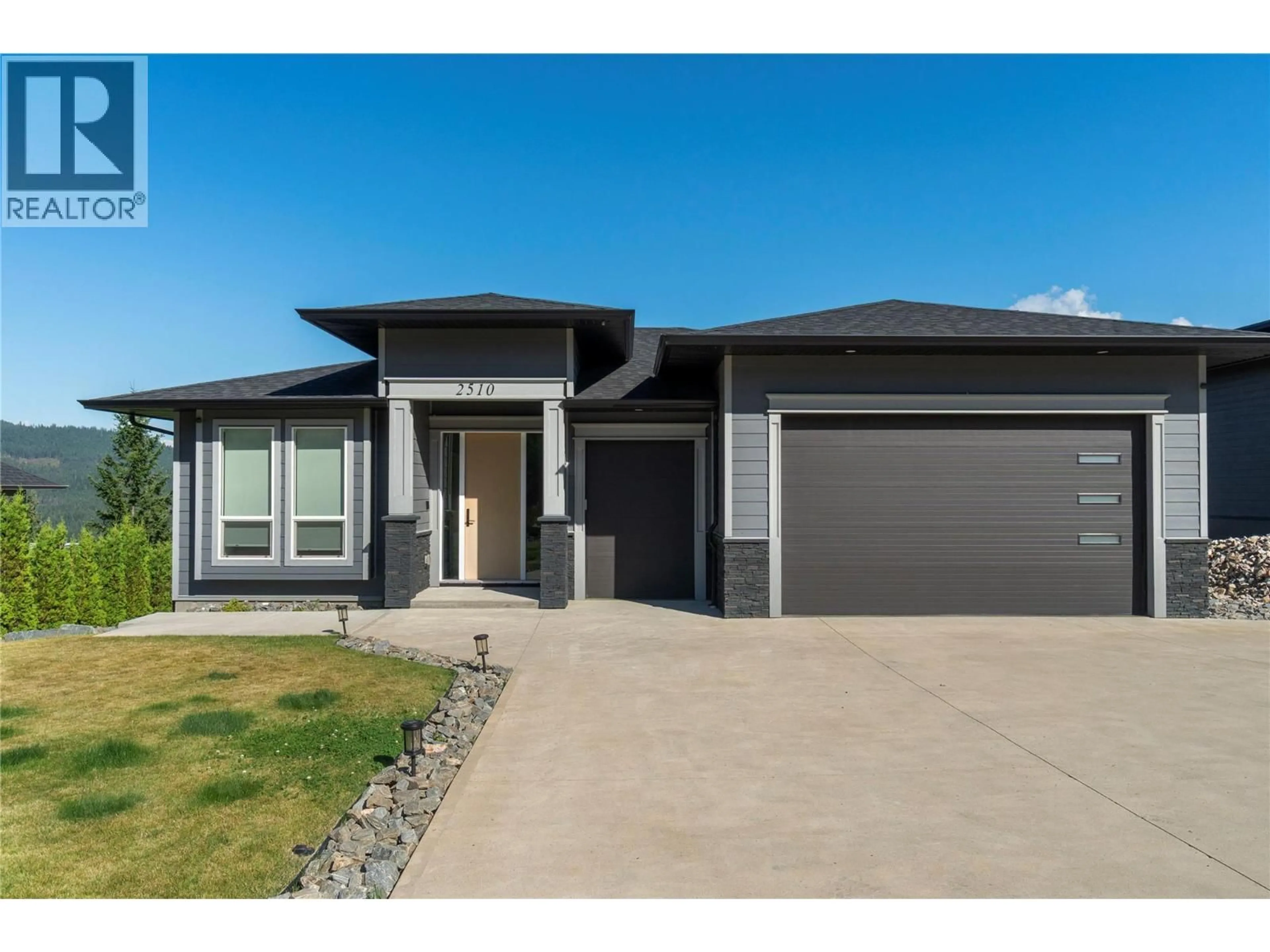 Home with brick exterior material, street for 2510 HIGHLANDS DRIVE, Blind Bay British Columbia V0E1H2