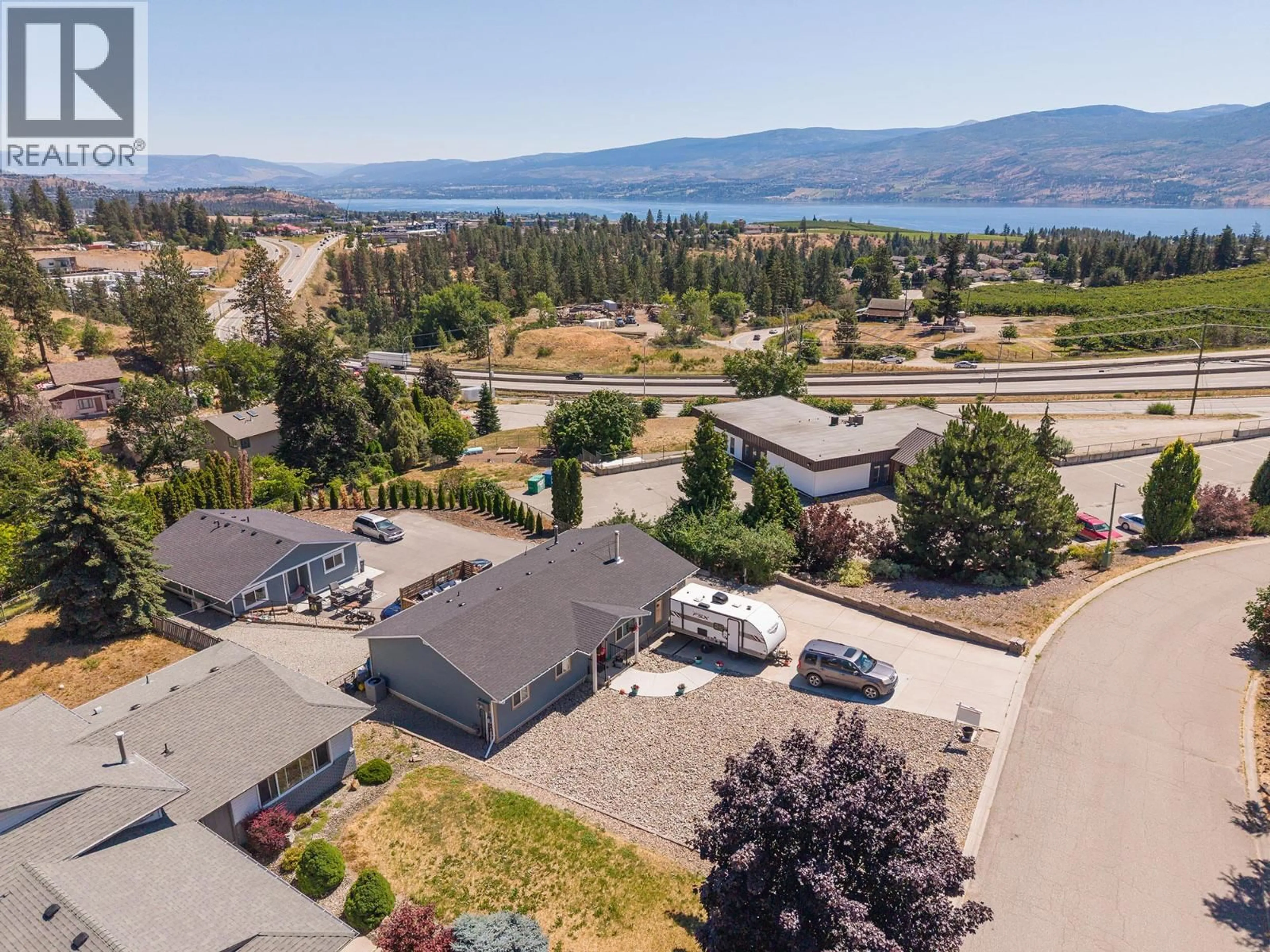 A pic from outside/outdoor area/front of a property/back of a property/a pic from drone, water/lake/river/ocean view for GLENWAY ROAD, West Kelowna British Columbia V4T1E2
