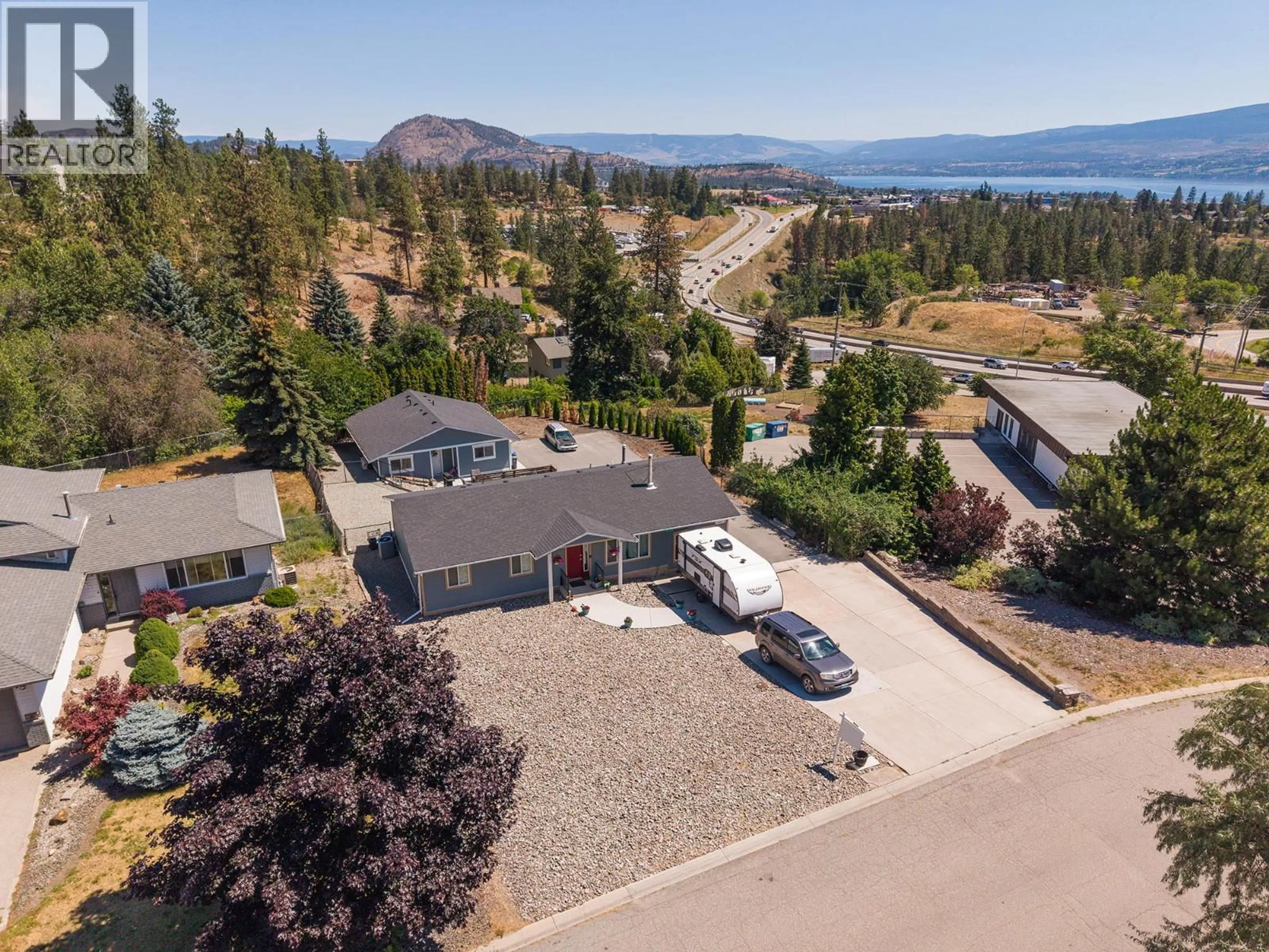 A pic from outside/outdoor area/front of a property/back of a property/a pic from drone, unknown for GLENWAY ROAD, West Kelowna British Columbia V4T1E2