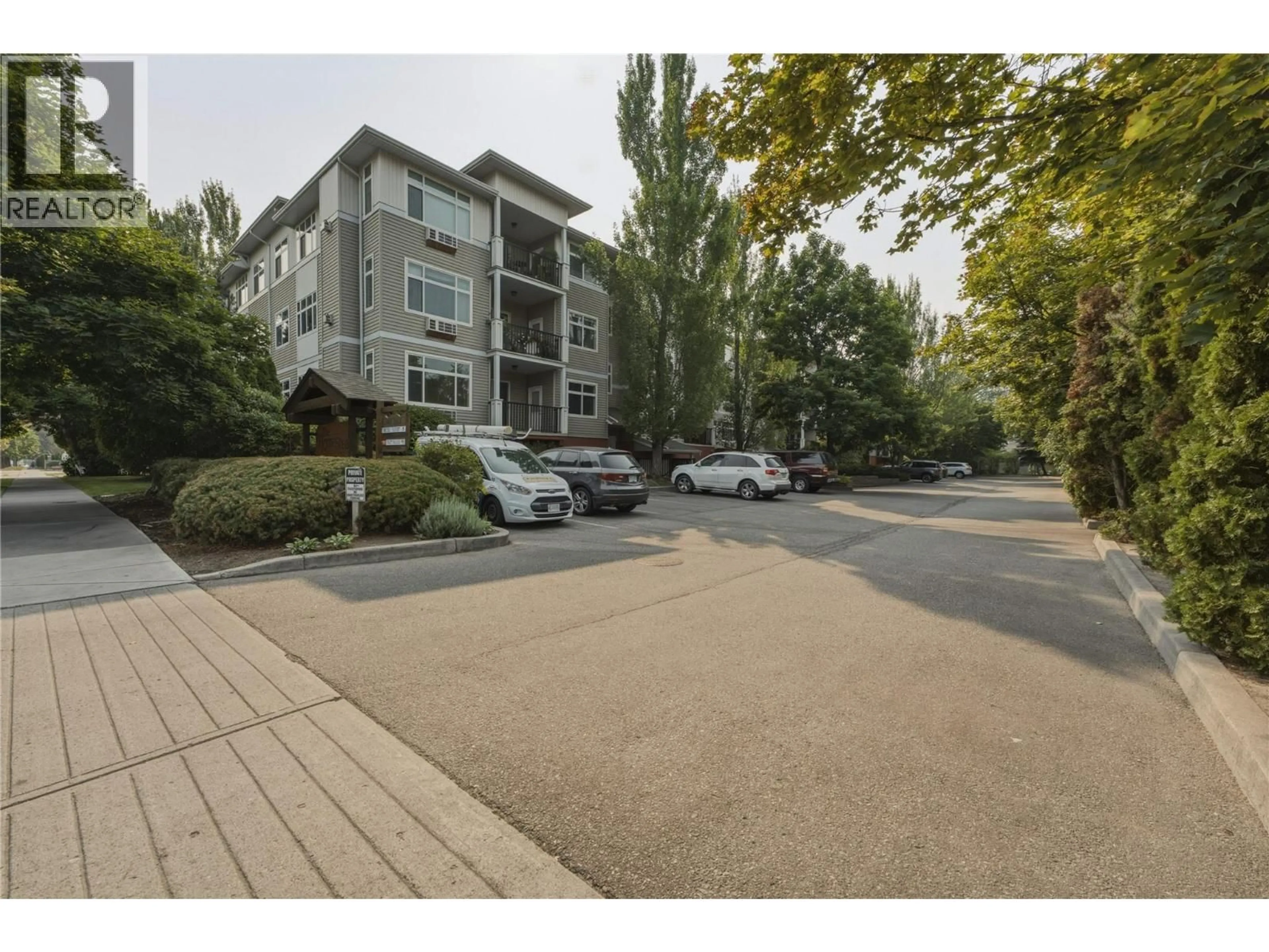 A pic from outside/outdoor area/front of a property/back of a property/a pic from drone, street for 107 - 1235 KLO ROAD, Kelowna British Columbia V1W3N7