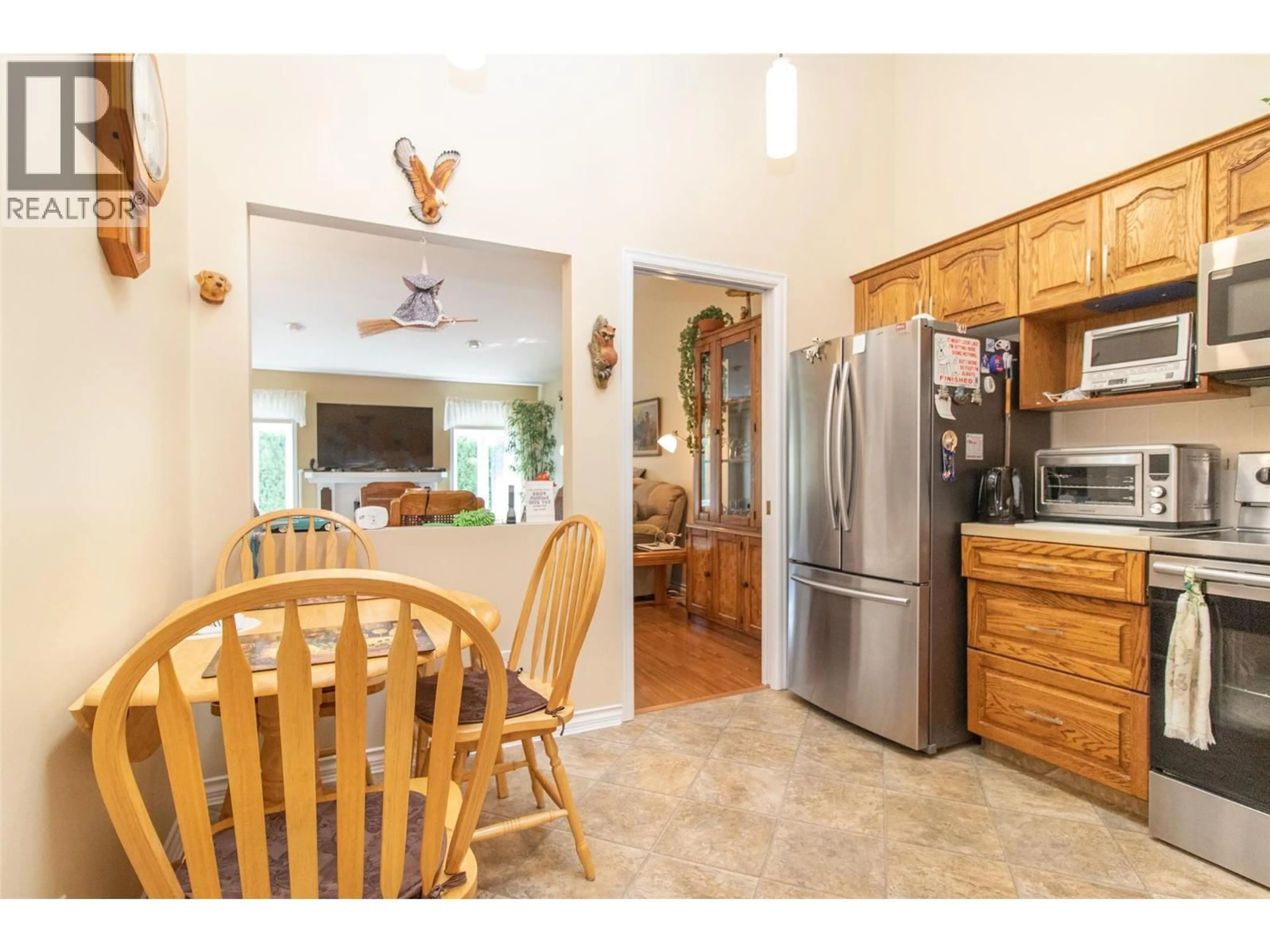 Open concept kitchen, ceramic/tile floor for 112 - 1885 PARKVIEW CRESCENT, Kelowna British Columbia V1X7E2