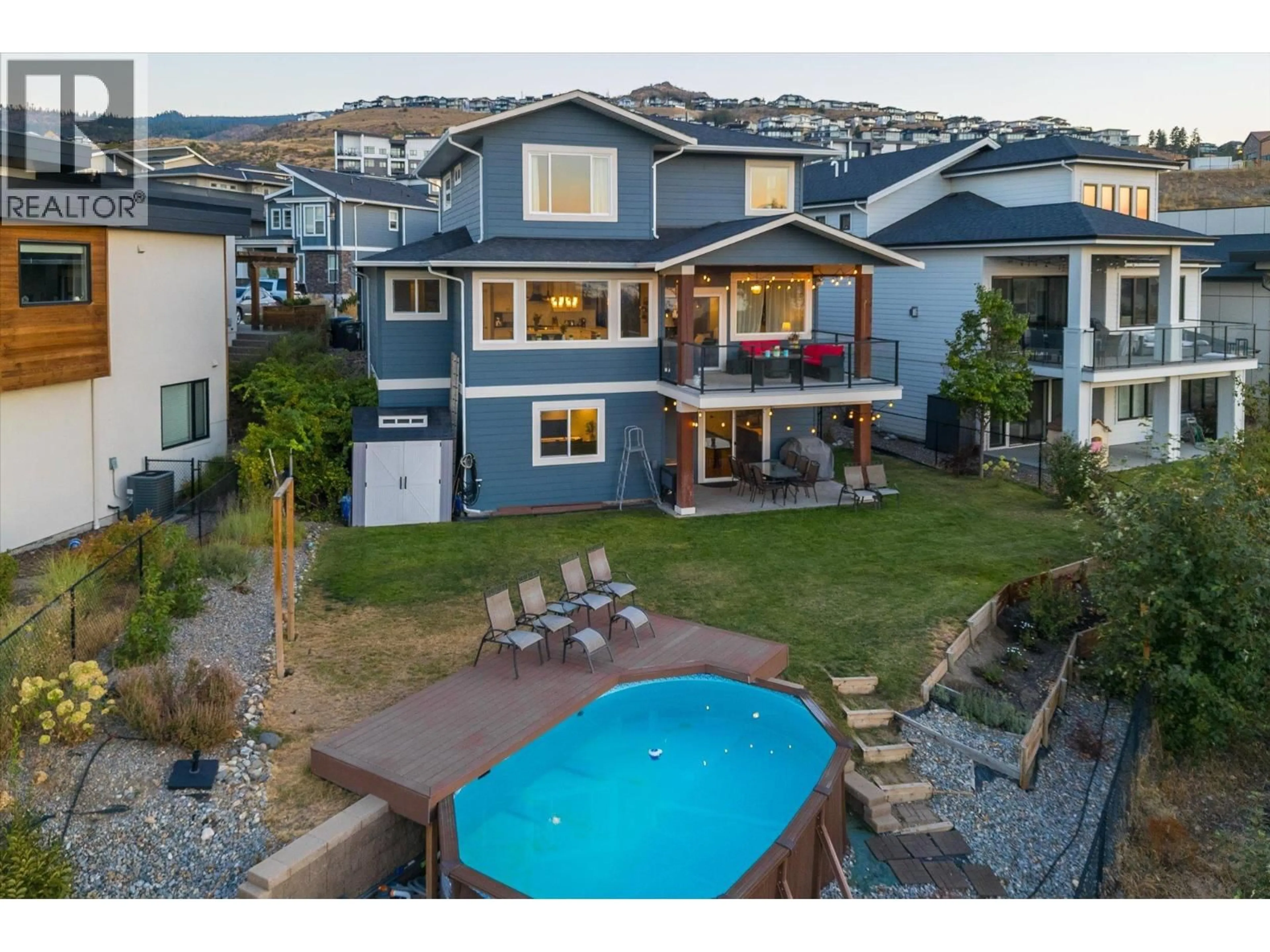 A pic from outside/outdoor area/front of a property/back of a property/a pic from drone, mountain view for 1160 GOLDFINCH PLACE, Kelowna British Columbia V1W5M1