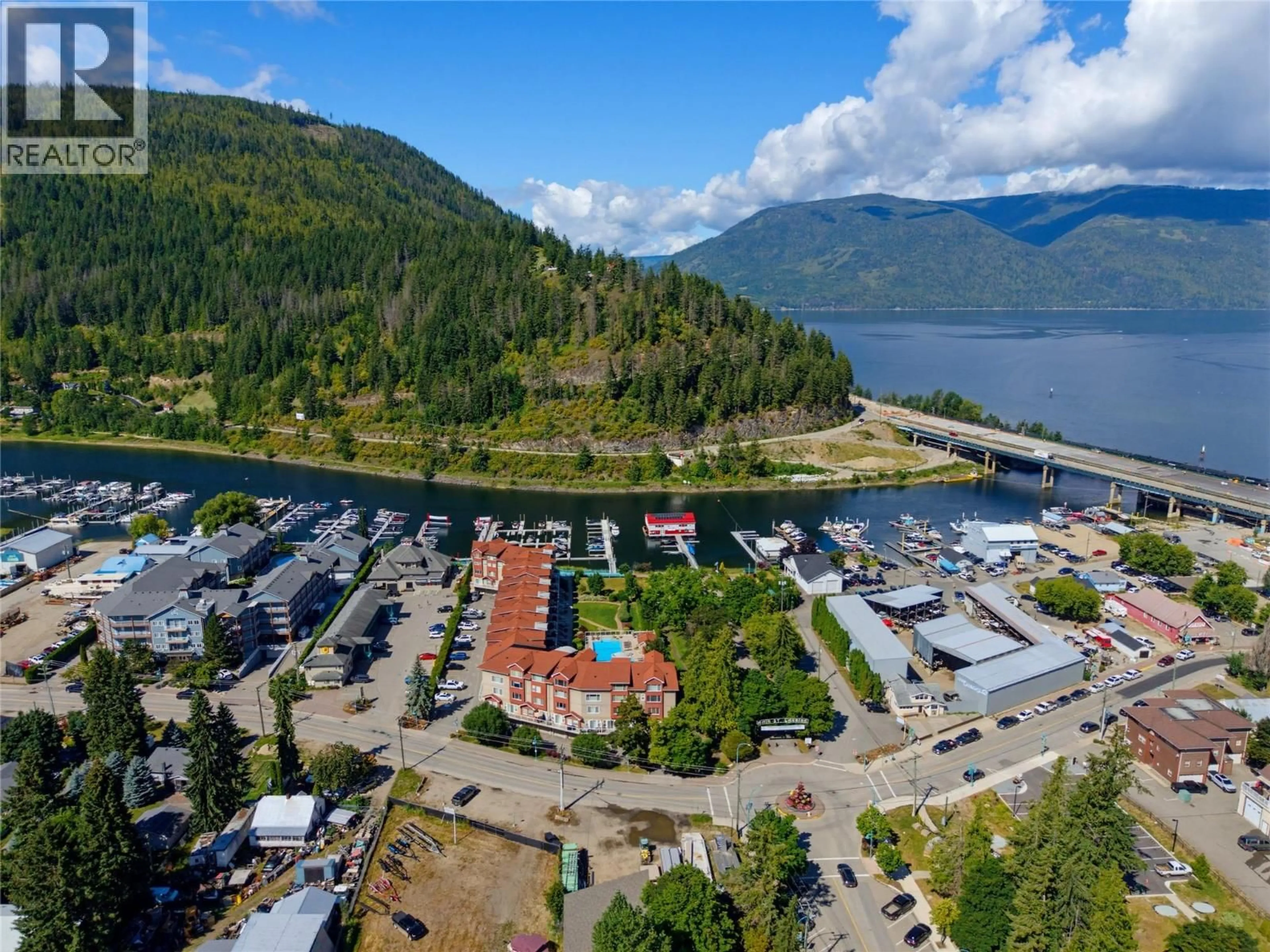 A pic from outside/outdoor area/front of a property/back of a property/a pic from drone, water/lake/river/ocean view for 14 - 1130 RIVERSIDE AVENUE, Sicamous British Columbia V0E2V1
