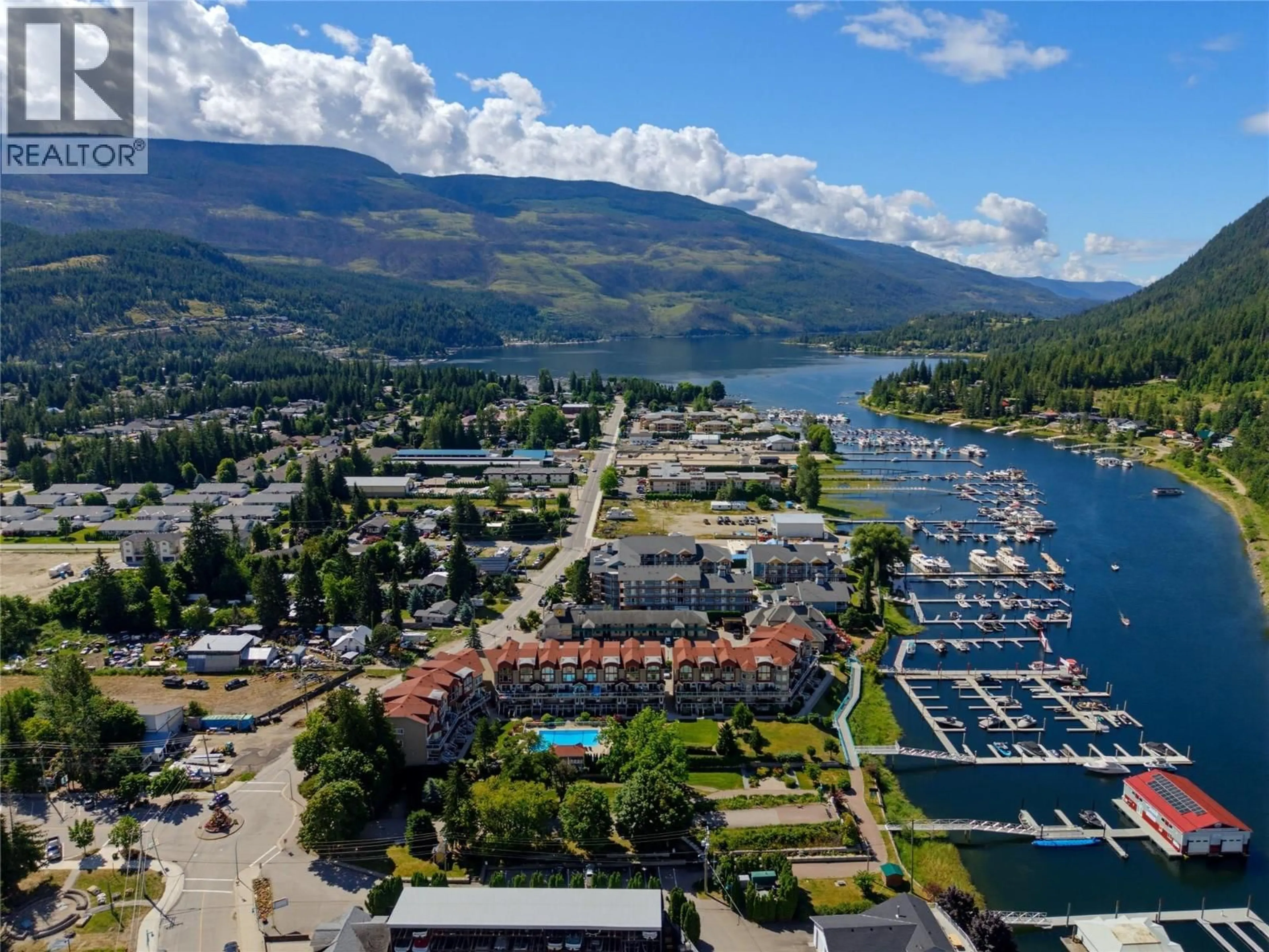 A pic from outside/outdoor area/front of a property/back of a property/a pic from drone, water/lake/river/ocean view for 14 - 1130 RIVERSIDE AVENUE, Sicamous British Columbia V0E2V1