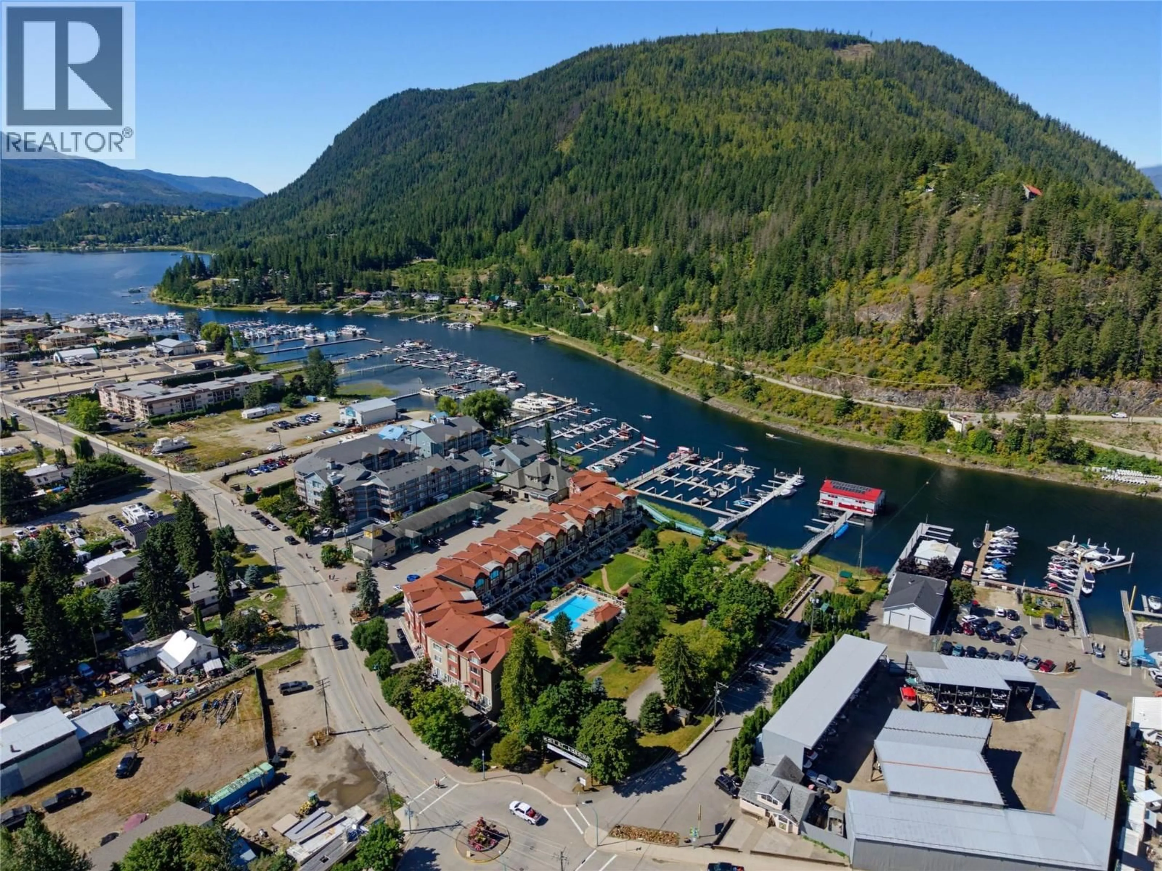 A pic from outside/outdoor area/front of a property/back of a property/a pic from drone, water/lake/river/ocean view for 14 - 1130 RIVERSIDE AVENUE, Sicamous British Columbia V0E2V1