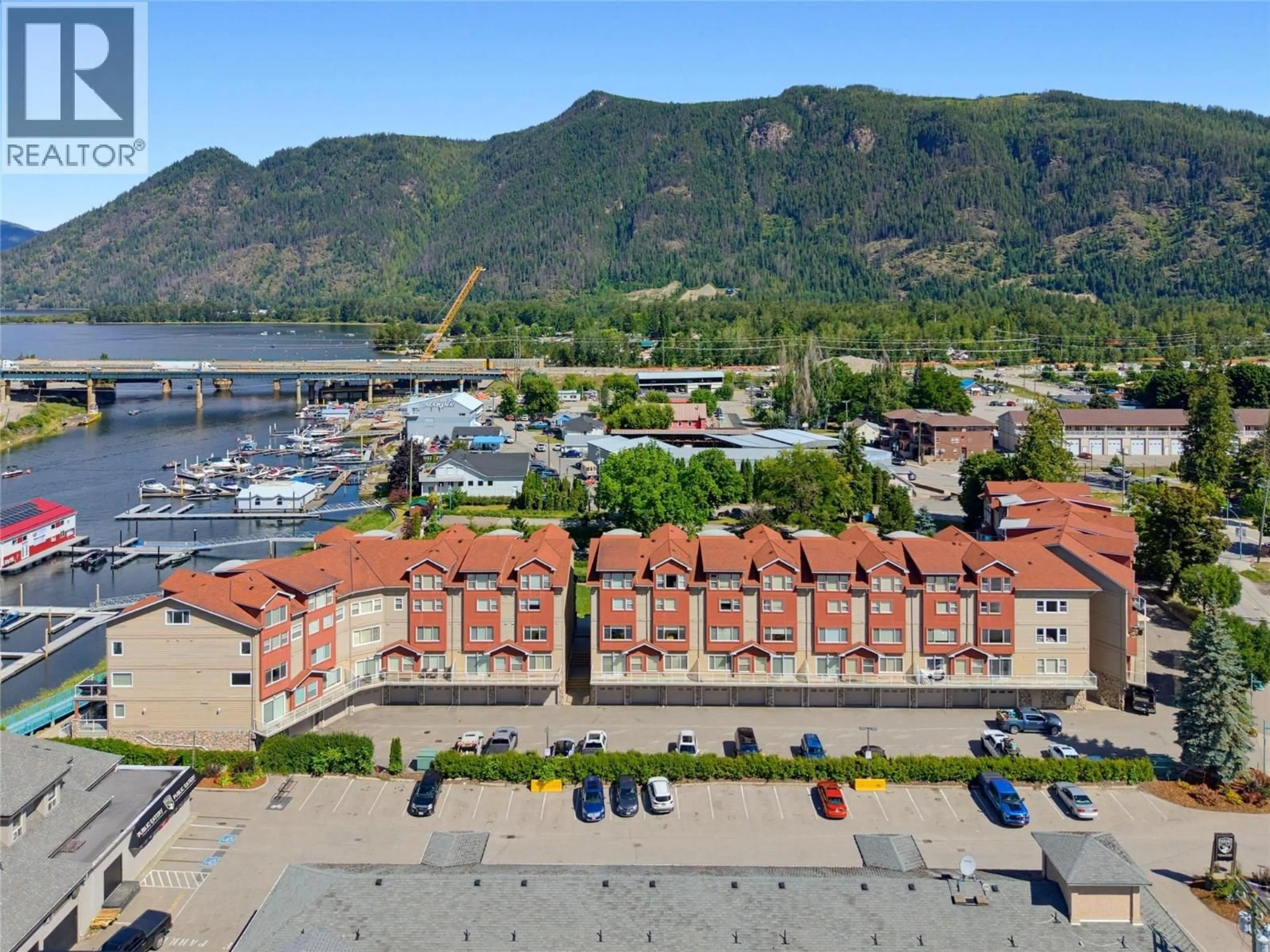 A pic from outside/outdoor area/front of a property/back of a property/a pic from drone, mountain view for 14 - 1130 RIVERSIDE AVENUE, Sicamous British Columbia V0E2V1