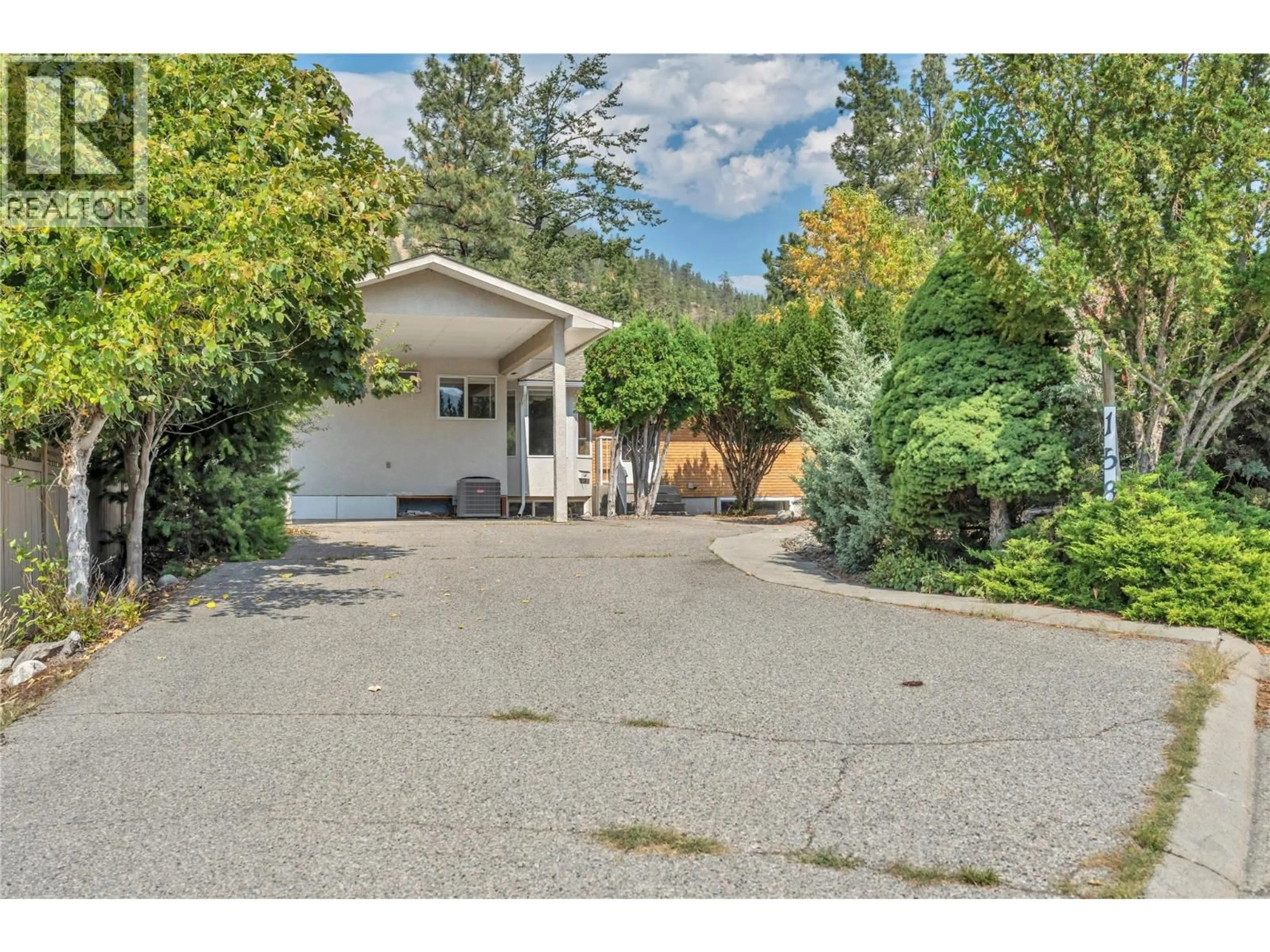 A pic from outside/outdoor area/front of a property/back of a property/a pic from drone, street for 158 GLEN PLACE OTHER, Penticton British Columbia V2A6T4