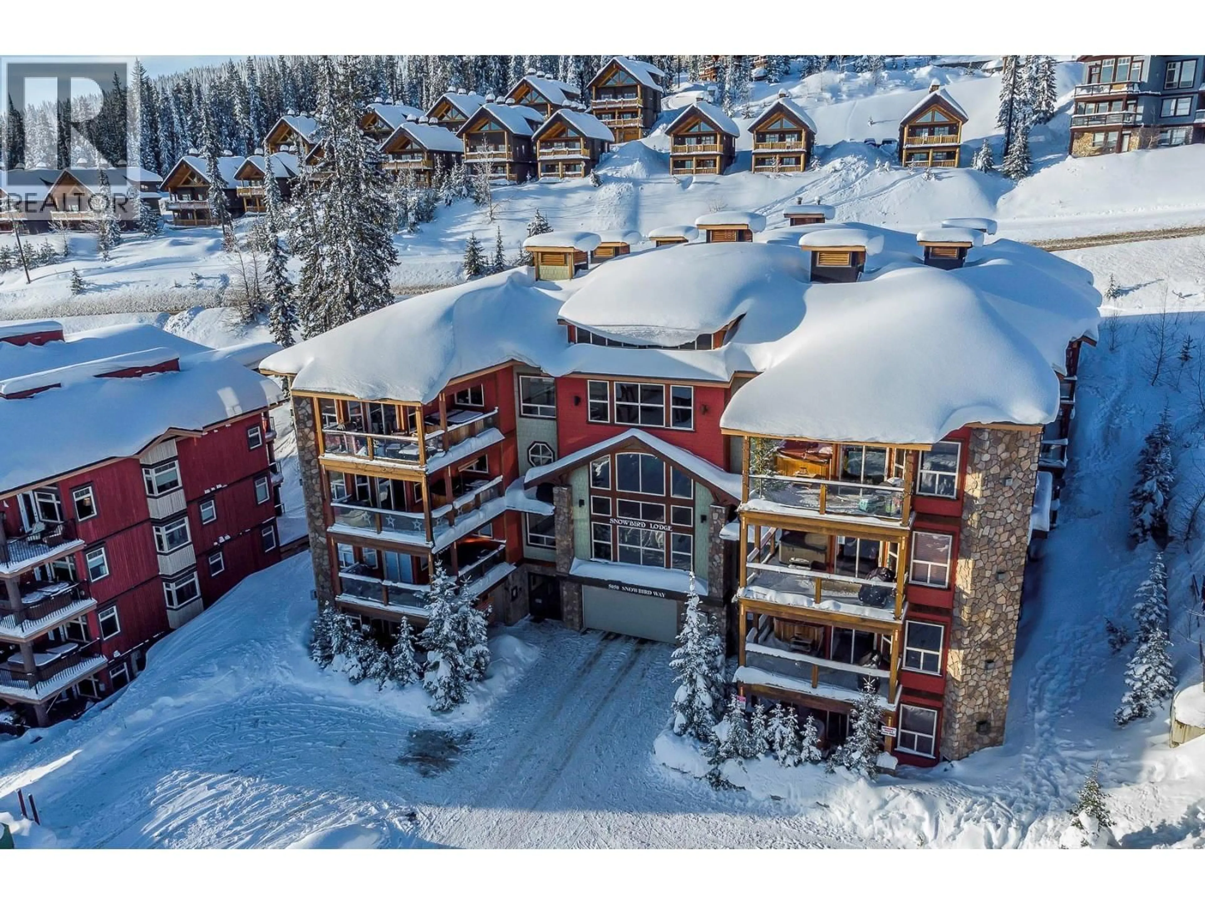 A pic from outside/outdoor area/front of a property/back of a property/a pic from drone, building for 204 - 5050 SNOWBIRD WAY, Big White British Columbia V1P1T4