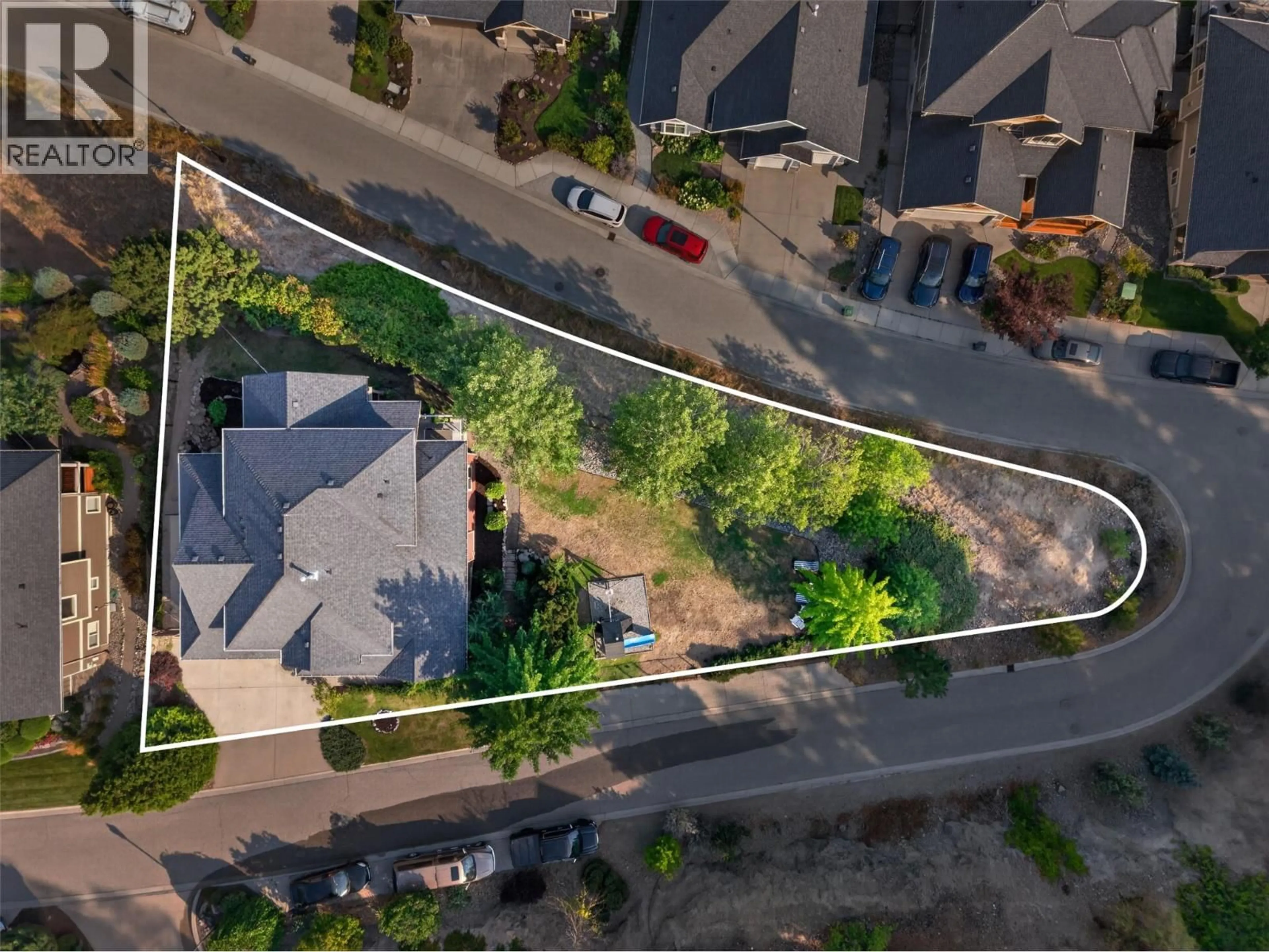 A pic from outside/outdoor area/front of a property/back of a property/a pic from drone, street for 155 TERRACE HILL COURT, Kelowna British Columbia V1V2T2
