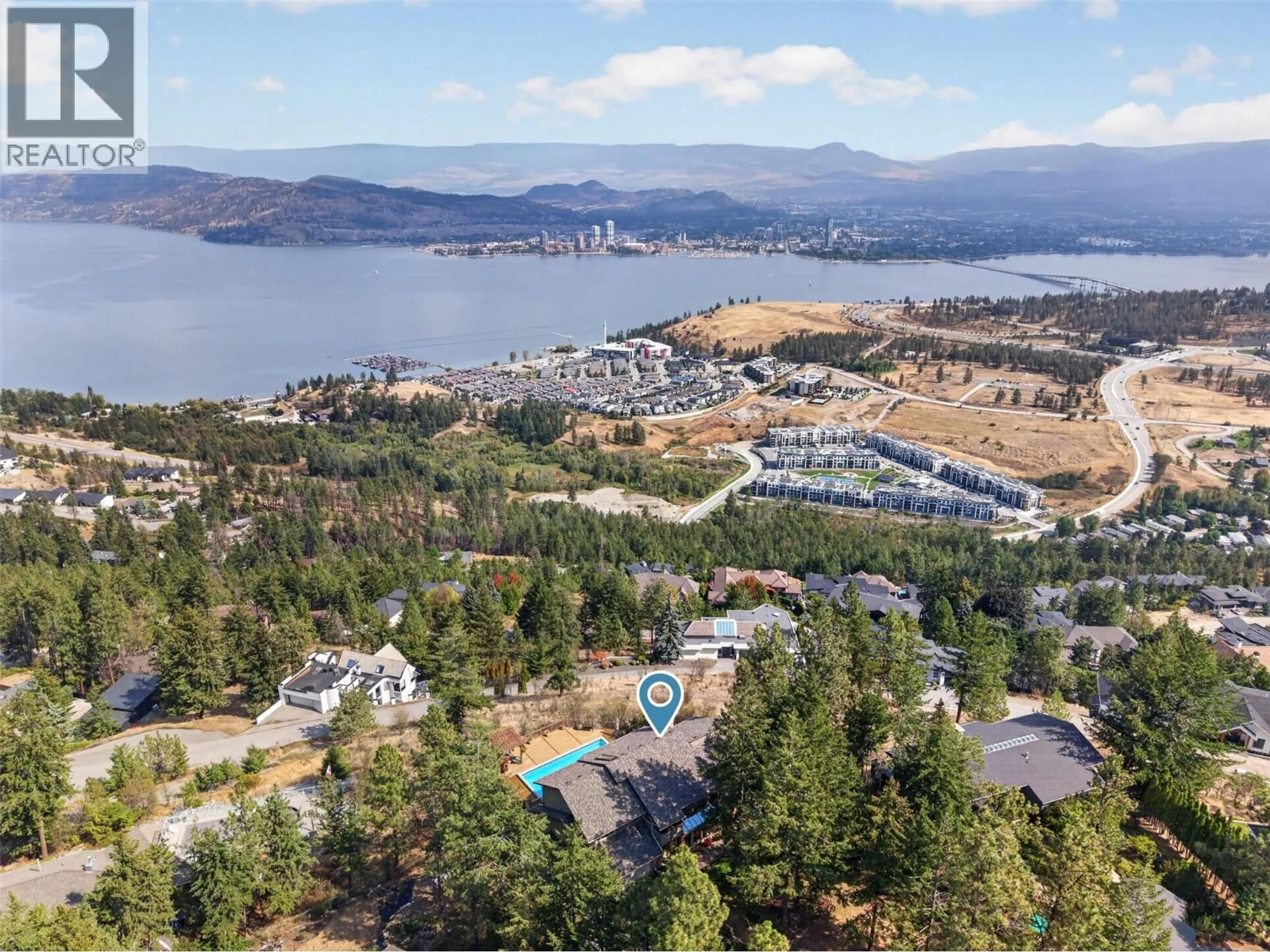 A pic from outside/outdoor area/front of a property/back of a property/a pic from drone, water/lake/river/ocean view for 1776 KELOKA DRIVE, West Kelowna British Columbia V1Z2X1