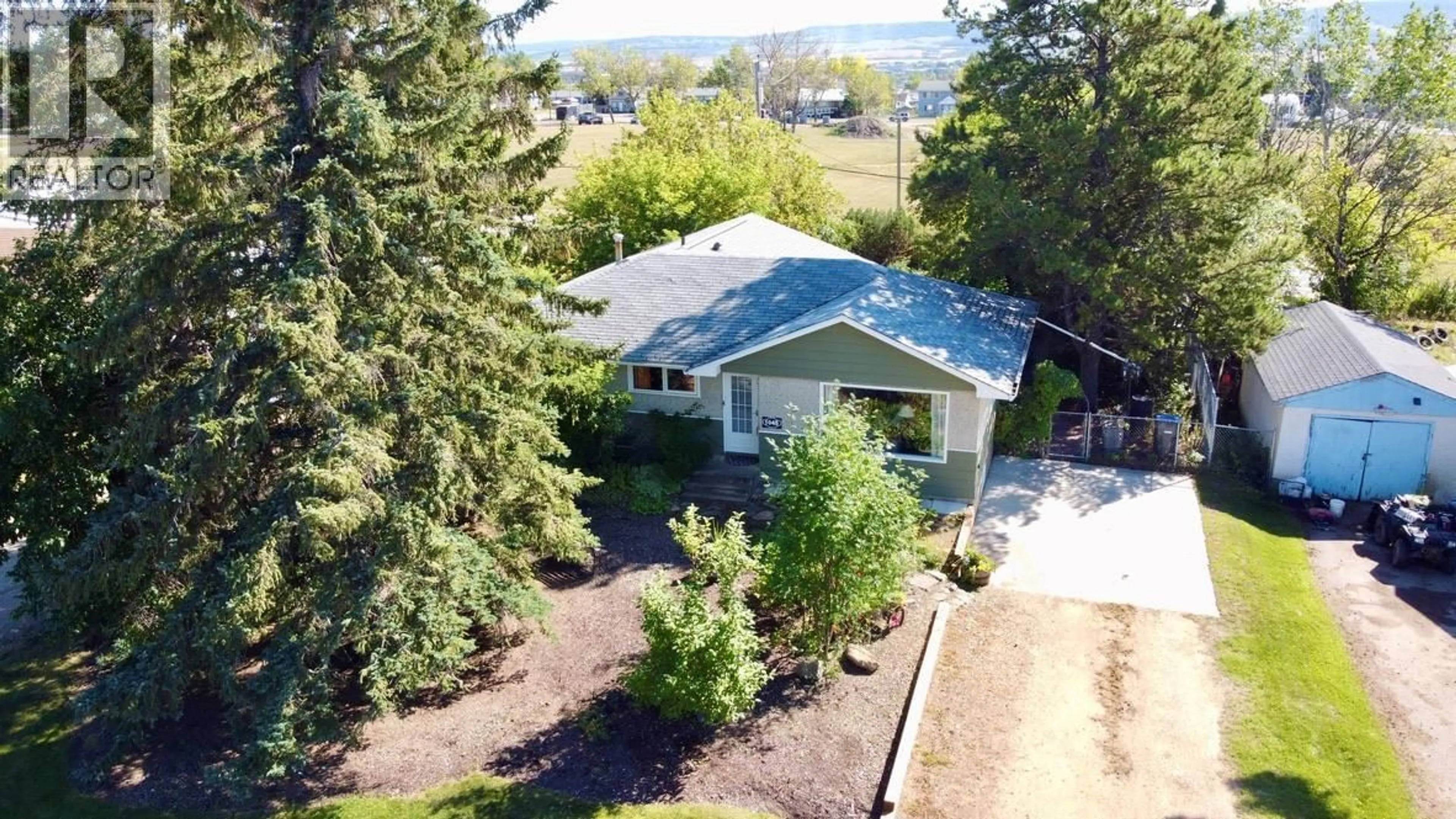 A pic from outside/outdoor area/front of a property/back of a property/a pic from drone, unknown for 1045 93 AVENUE, Dawson Creek British Columbia V1G1E3