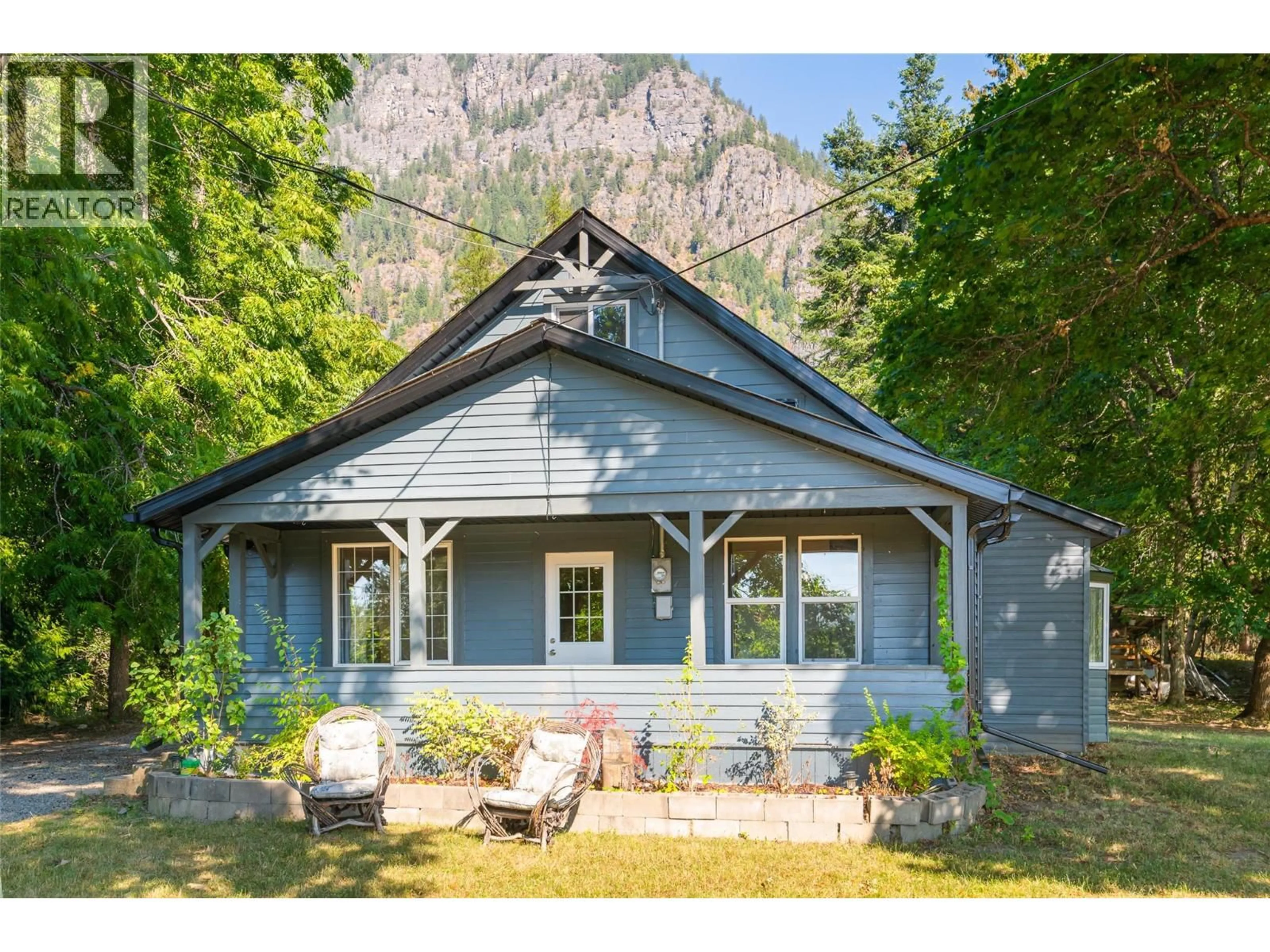 Home with vinyl exterior material, mountain view for 4638 SAMUELSON ROAD, Canyon British Columbia V0B1C1