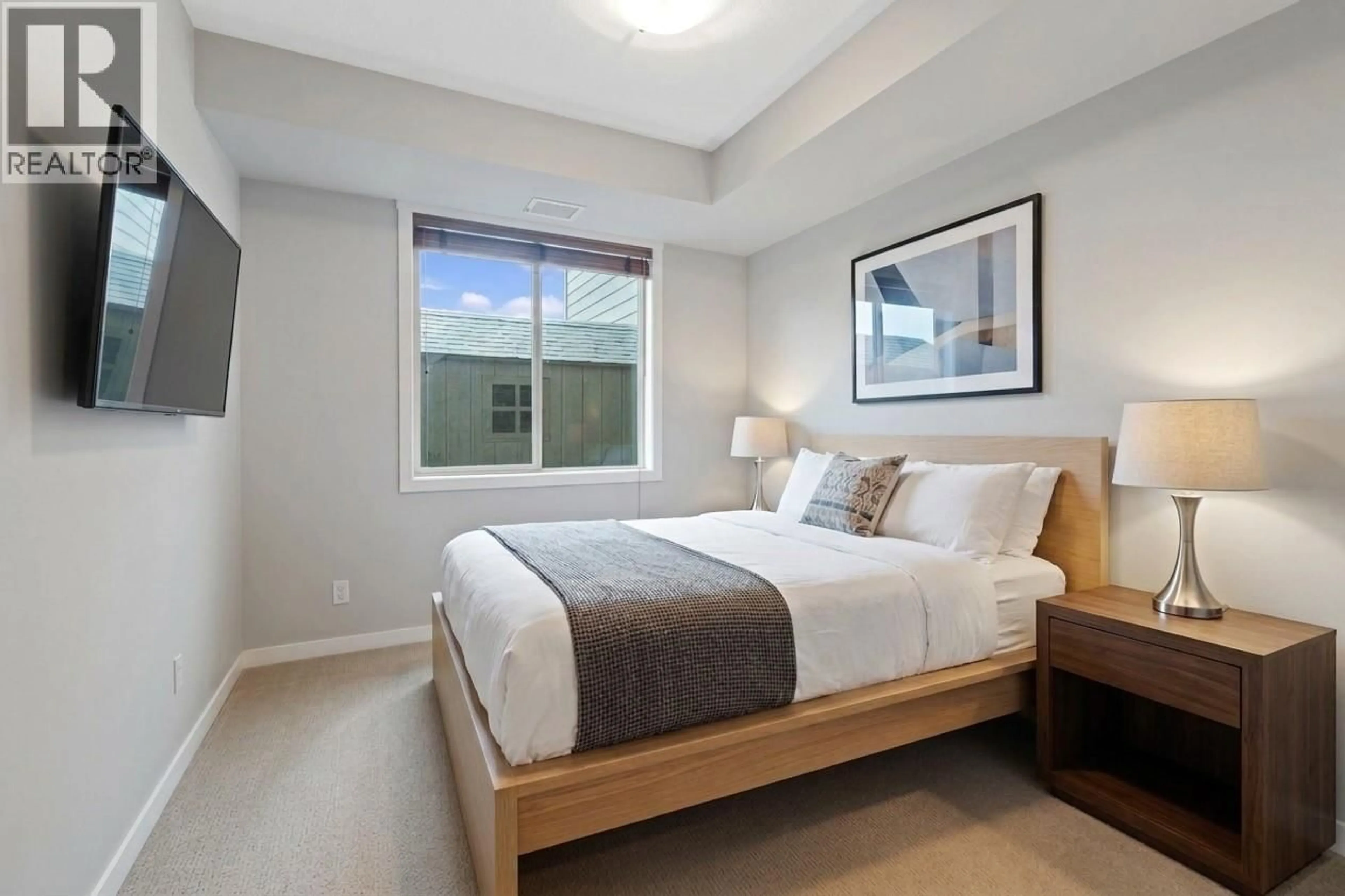 Bedroom with bed, unknown for 107 - 2142 VASILE STREET, Kelowna British Columbia V1Y6H5